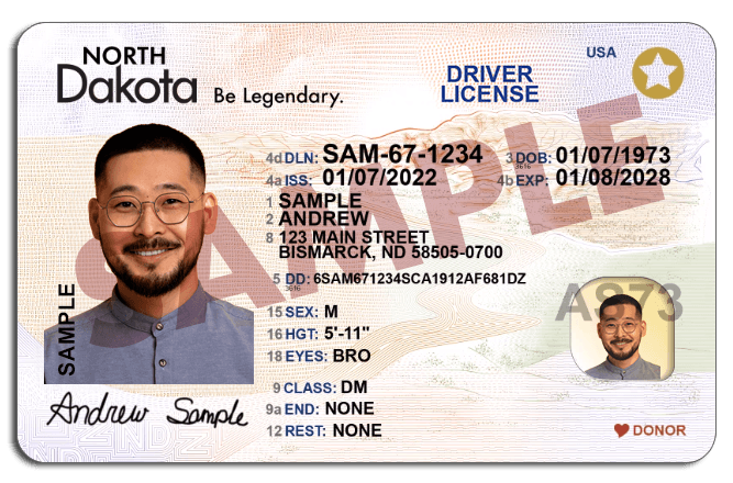 Sample North Dakota driver's license with REAL ID gold star in top right corner, featuring photo, personal details, and security features.