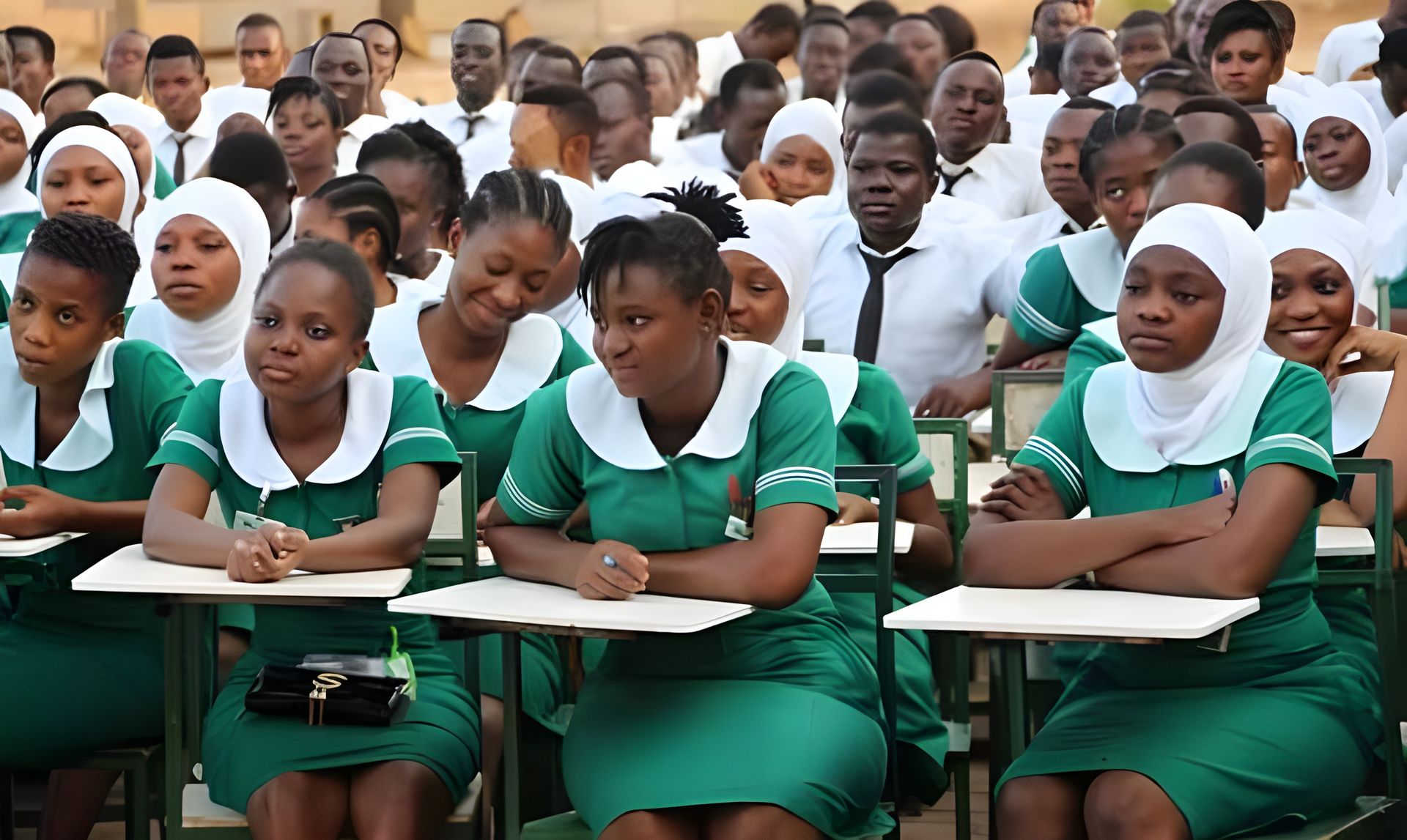 woman in white shirt using smartphone