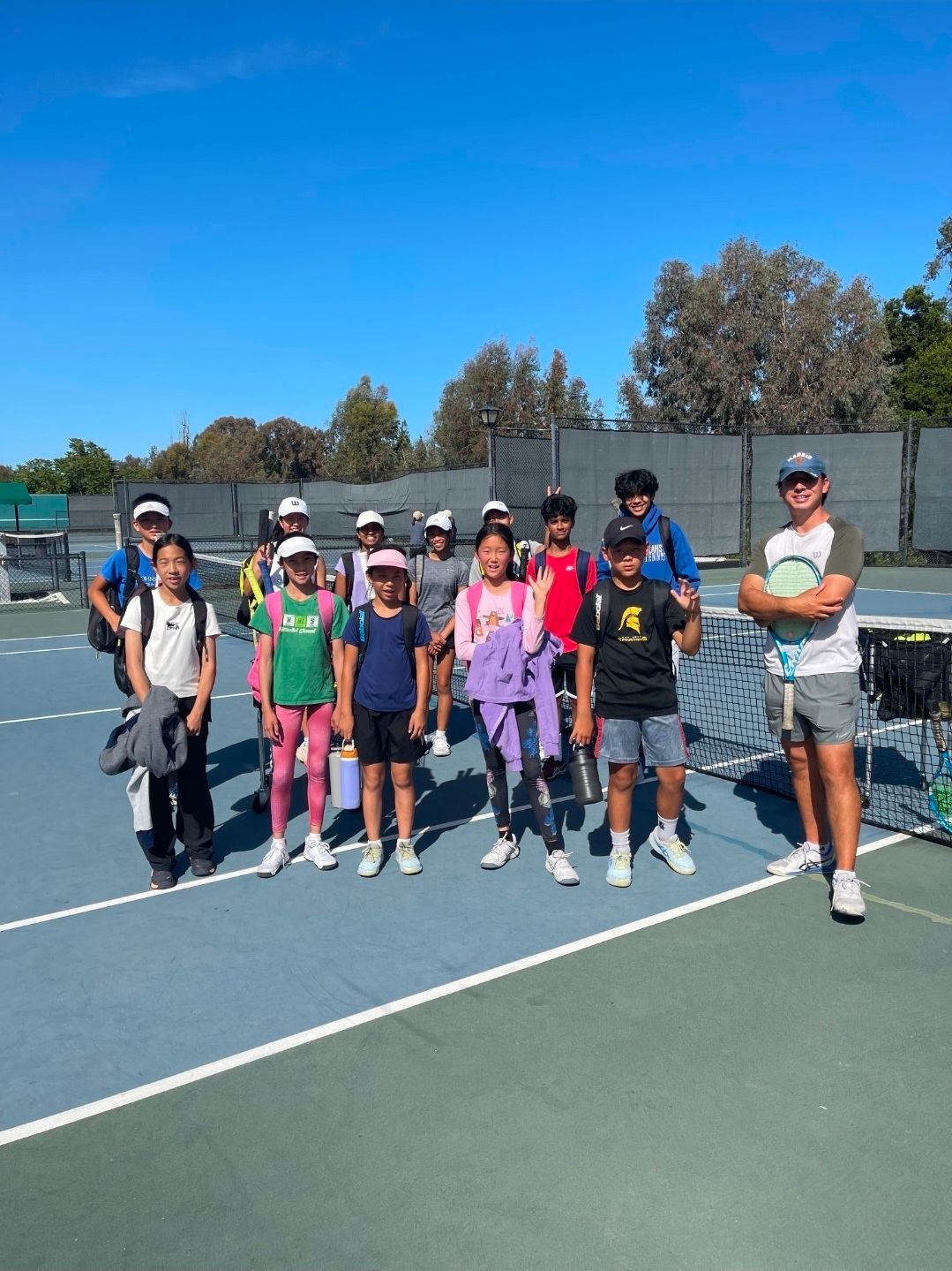 YUMA tennis players on the court