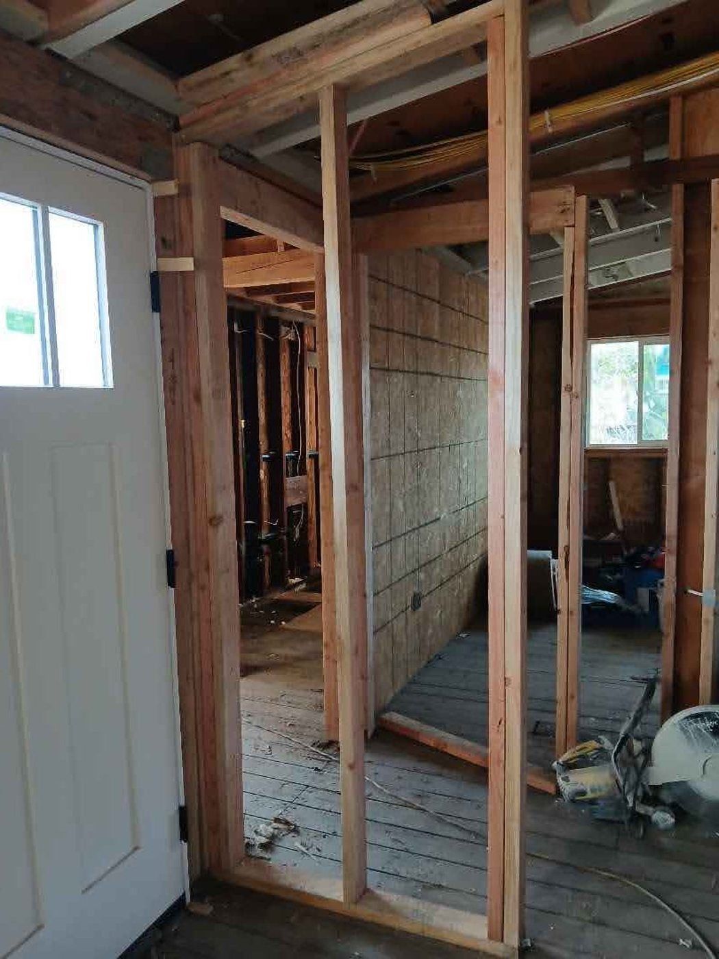 Concord project, photo 09: Interior wall framing exposed