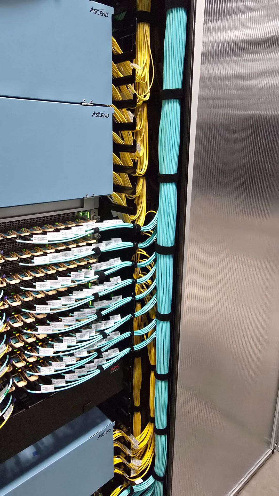 Enterprise
  data center rack and fiber installation