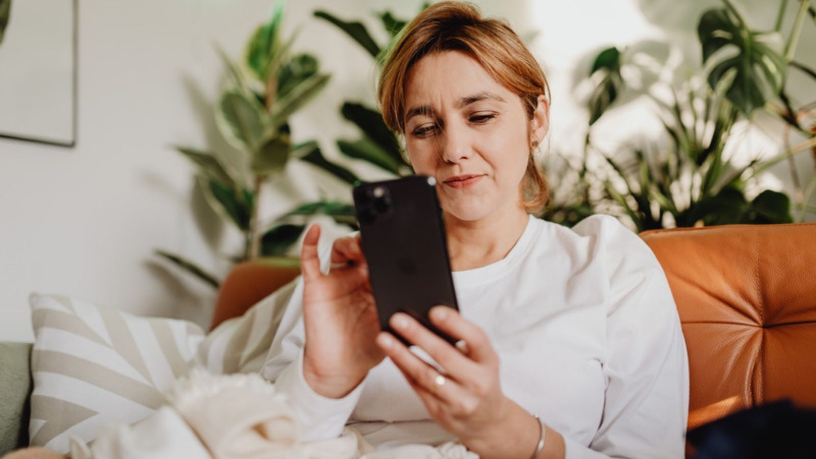 Woman checking her phone at home, My Online Shopping Routine From Search to Delivery