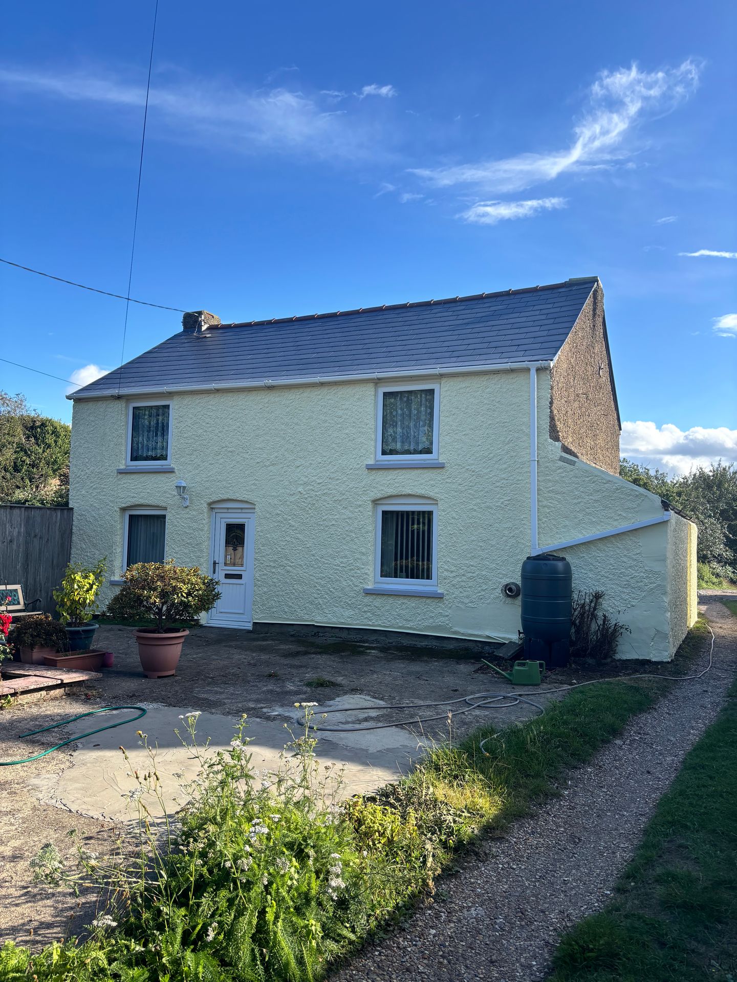 House in Emneth after painting with Sandtex Cornish Cream masonry paint, showing fresh and durable finish.