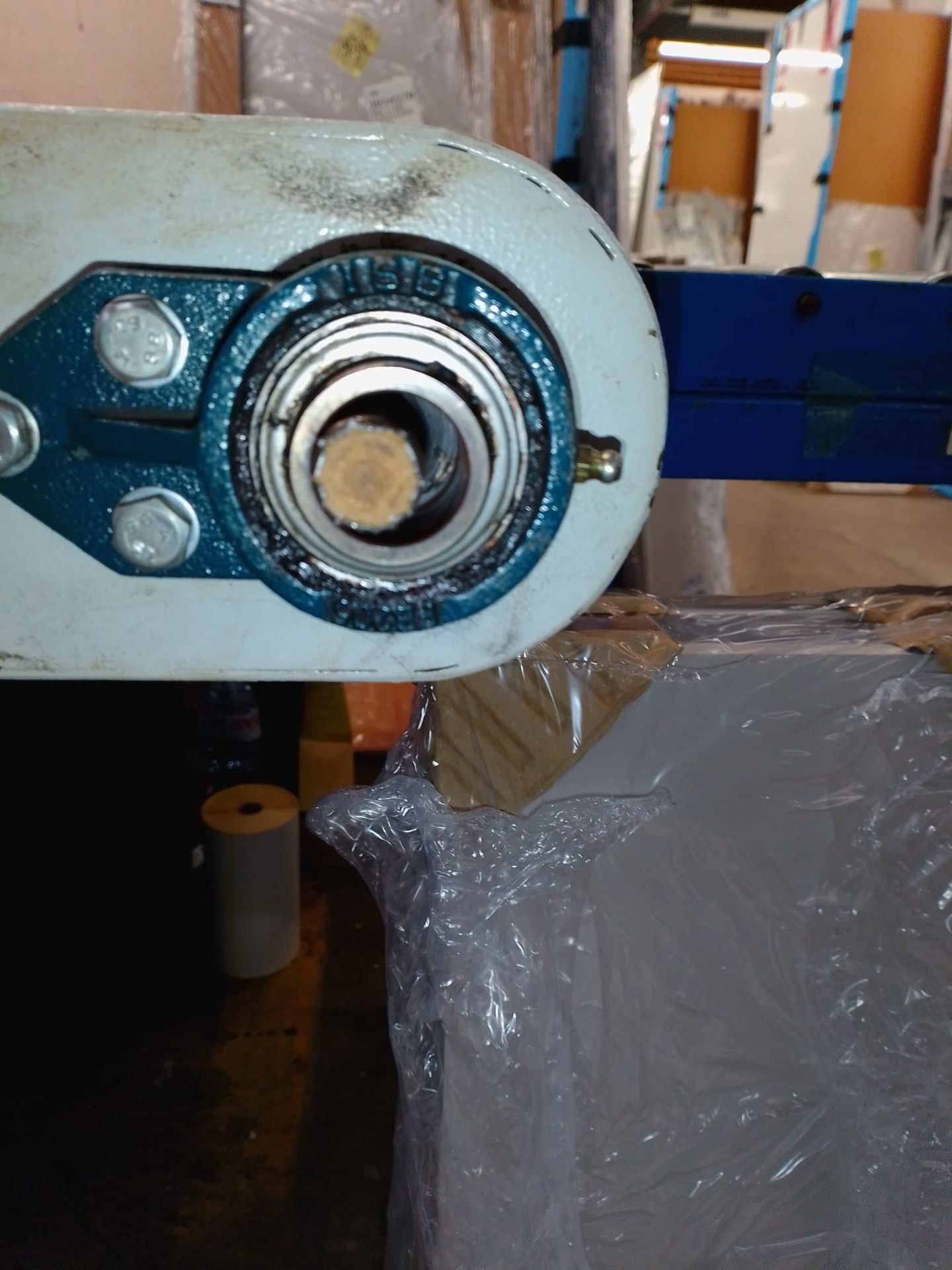 Convyor roller worn excessively, repaired onsite, welding up end to attach new bearing