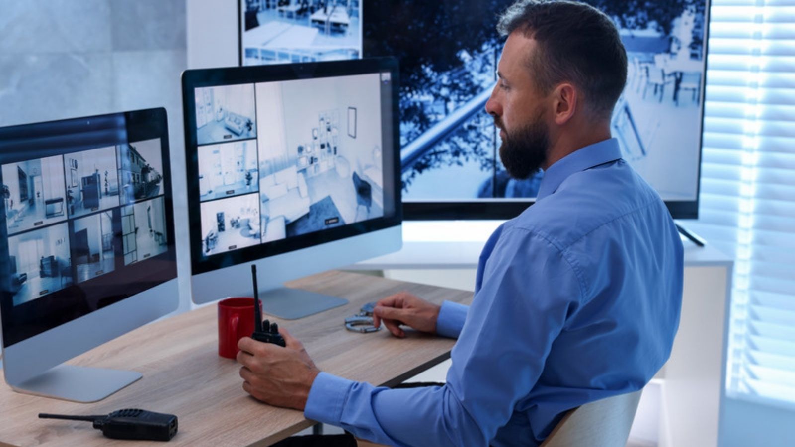 Security specialist at a desk watching monitors, Securing Your Home Network Step by Step