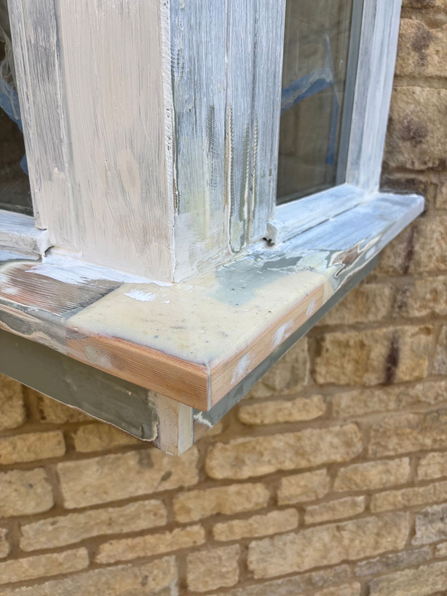 Timber window corner rebuilt with Timbabuild resin filler, sanded smooth and ready for paint.