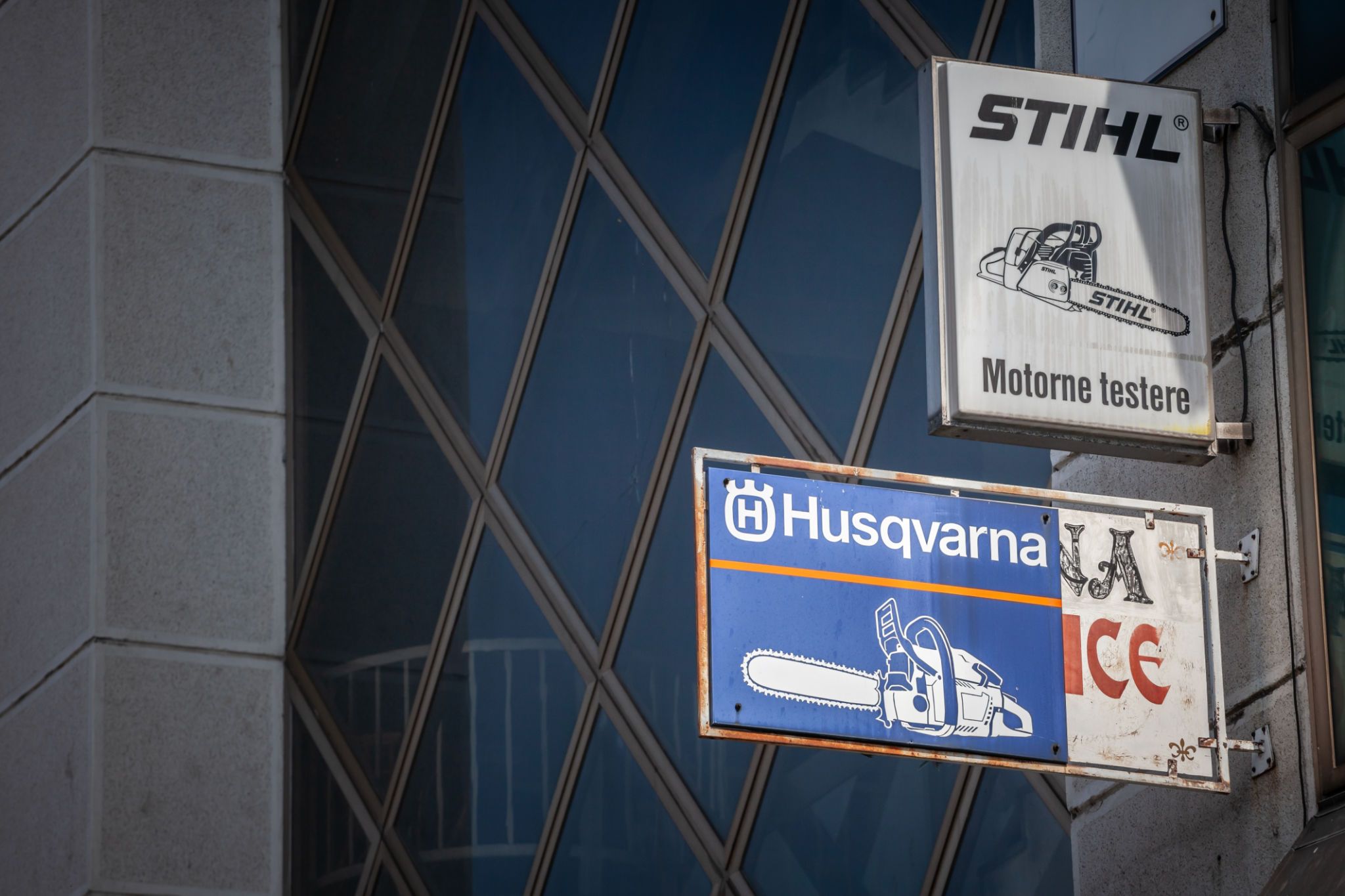 Logos of Stihl and Husqvarna at a Belgrade retailer. husqvarna and Stihl are brands producing professional machinery and agricultural devices.