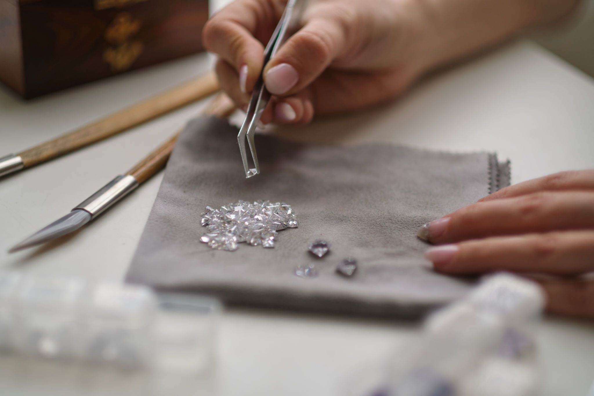 Craft jewelery making with professional tools. A handmade jeweler process, manufacture of jewellery Craft jewelery making with professional tools. A handmade jeweler process, manufacture of jewellery