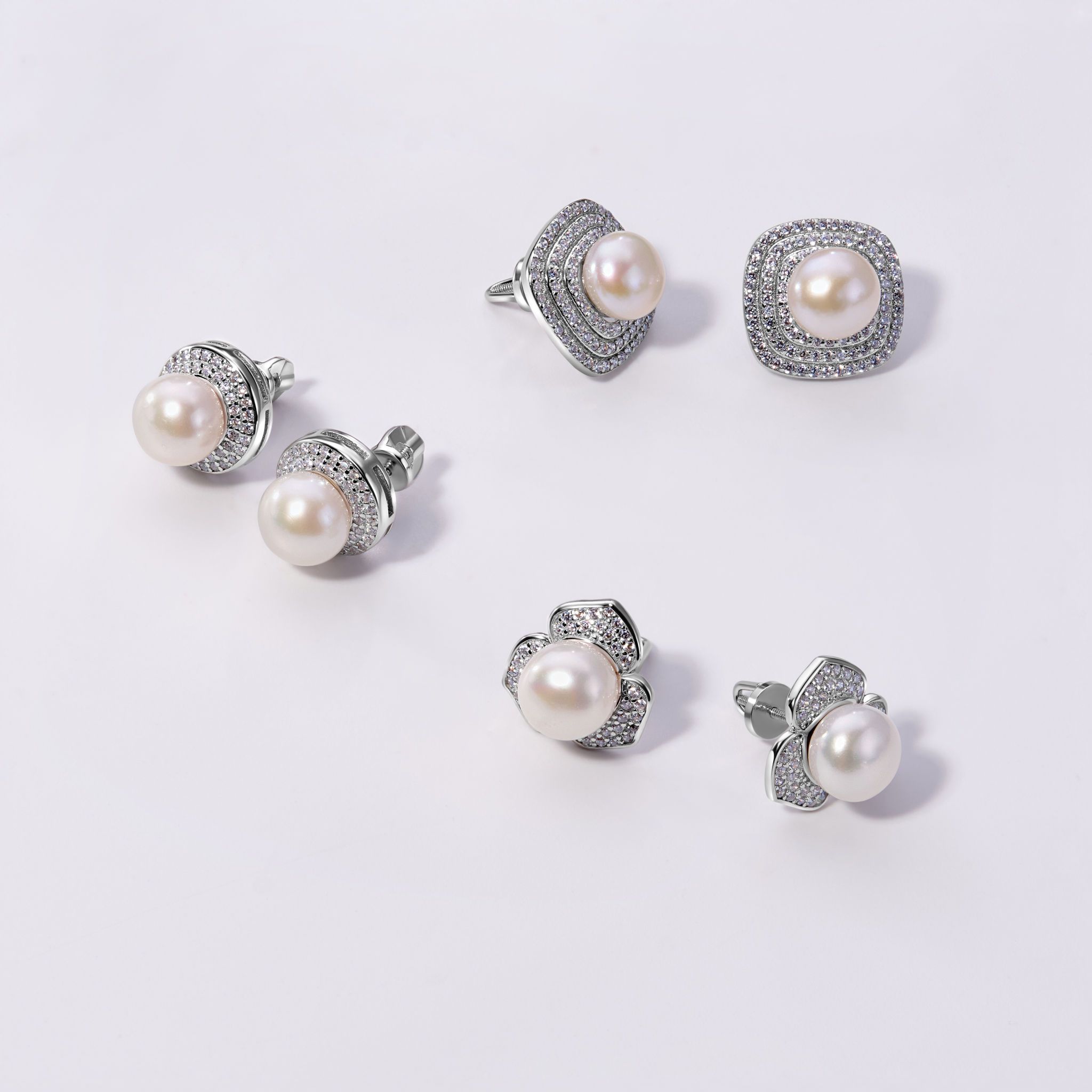 Elegant jewelry set. Jewellery set with gemstones. Jewelry accessories collage. Product still life concept. Ring, necklace and earrings.