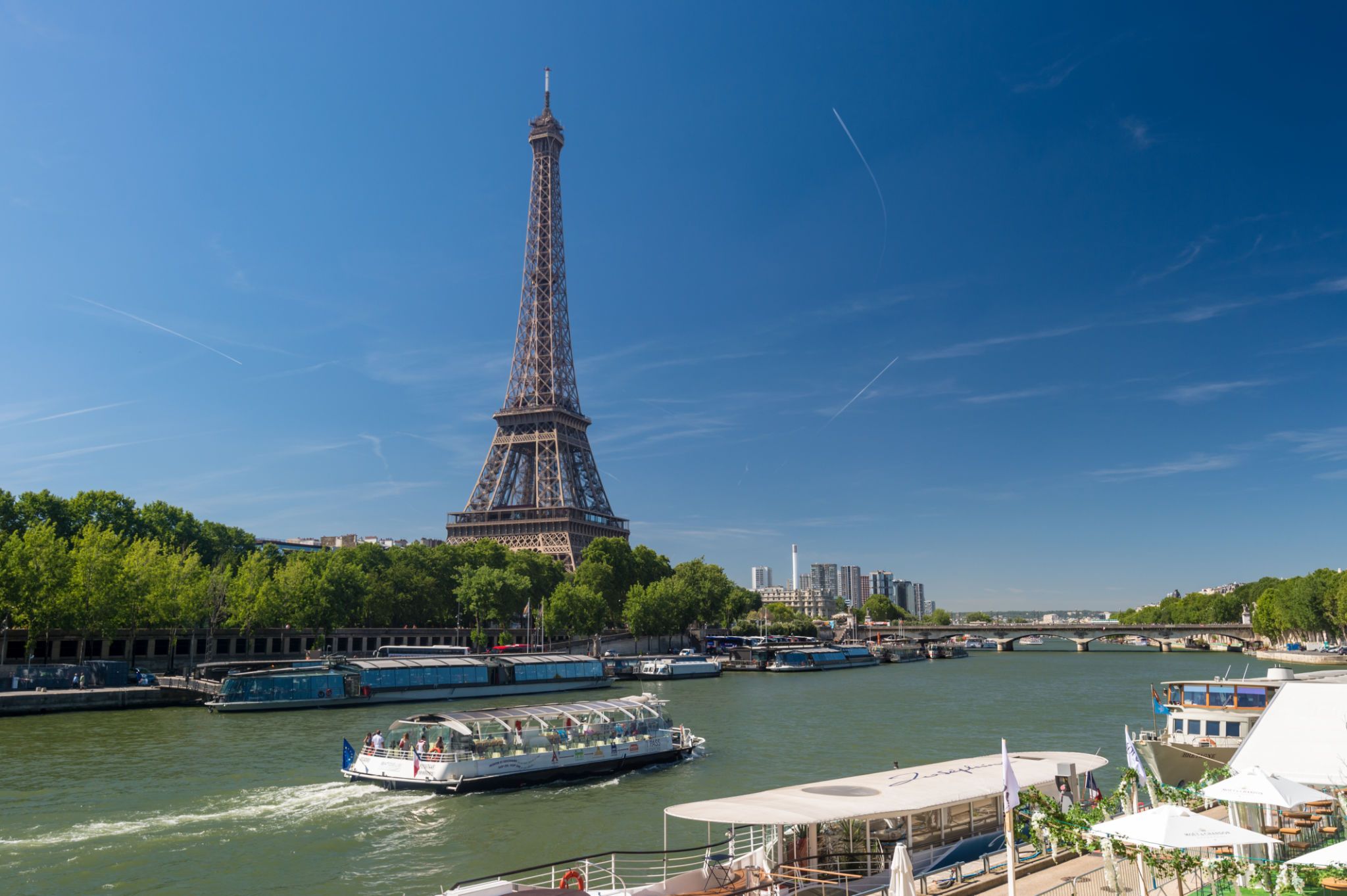 Bateau Mouche on the Seine river with Eiffel Tower in the background