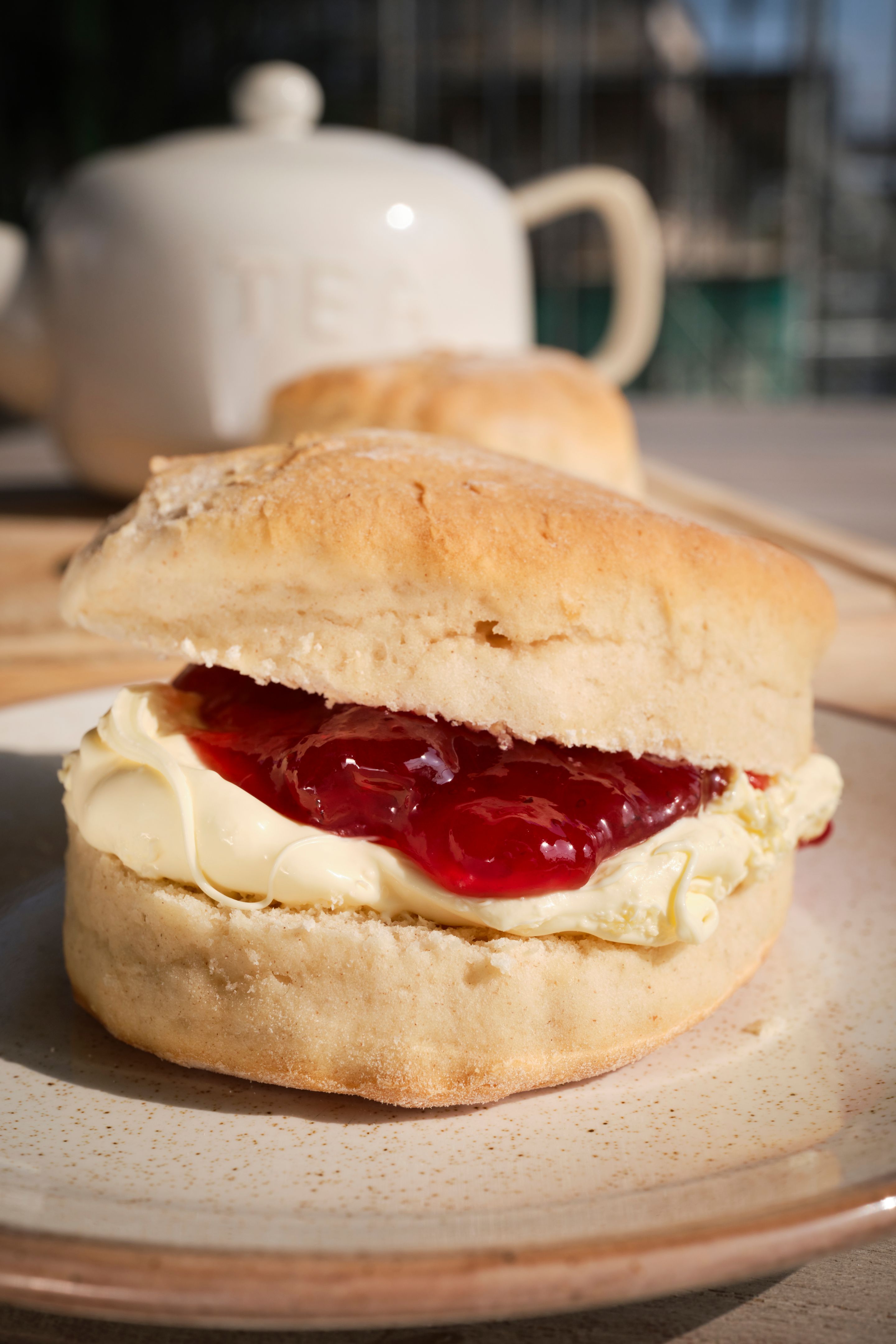 Cream Tea, Traditional Devon Cream Scone - clotted cream first, then the jam.