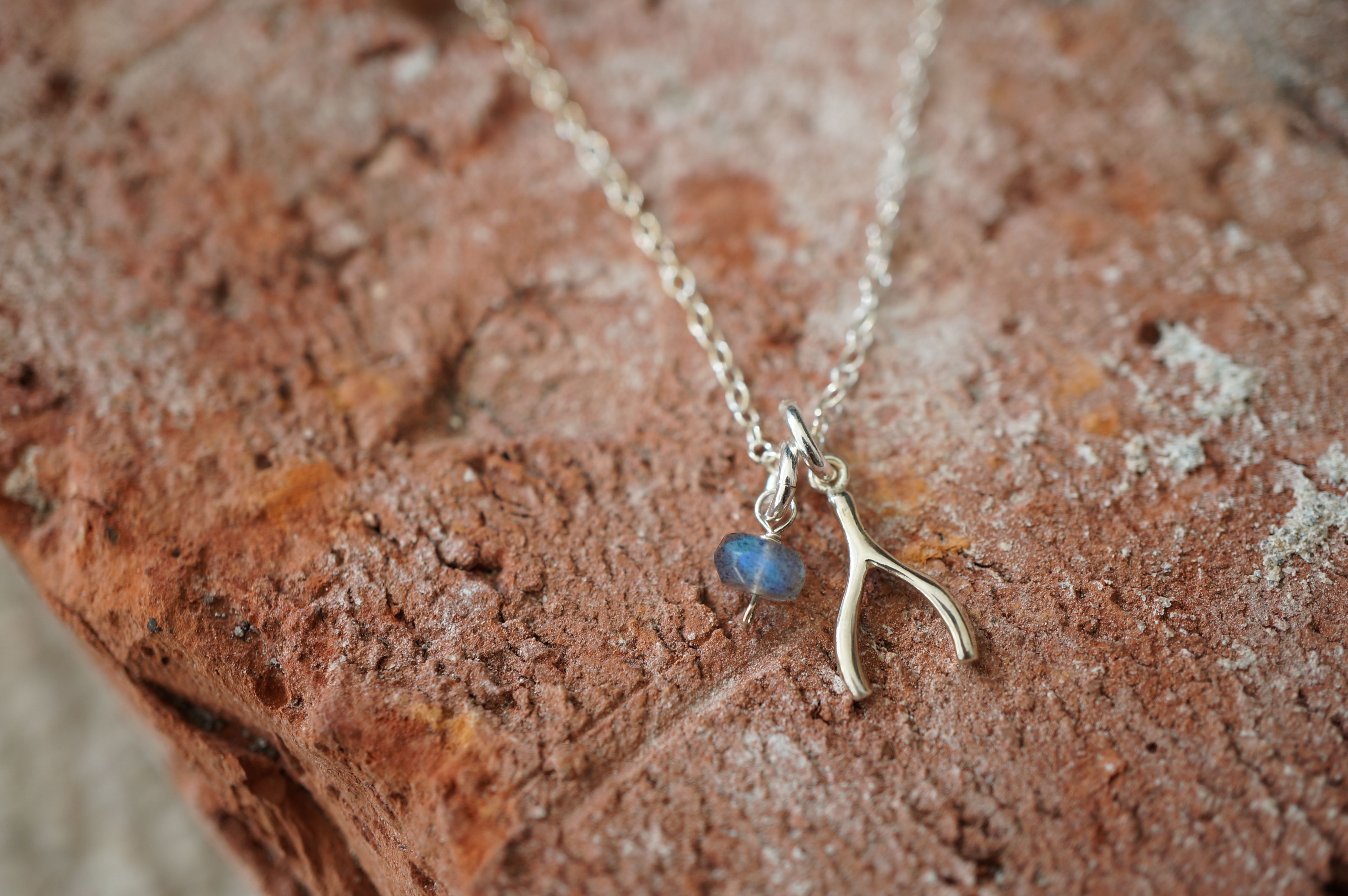 Wishbone silver necklace with small gemstone