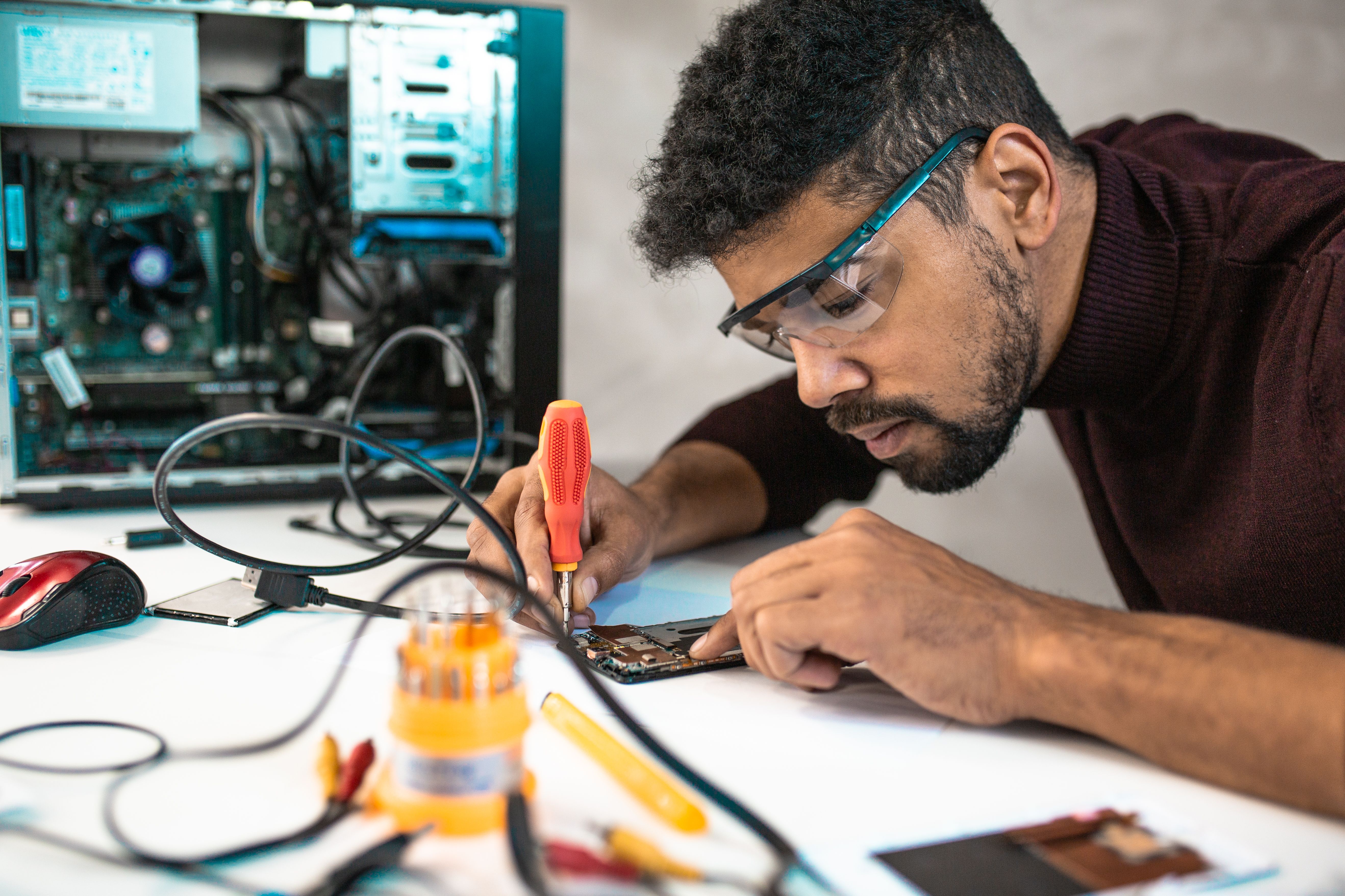 technician repairing computer