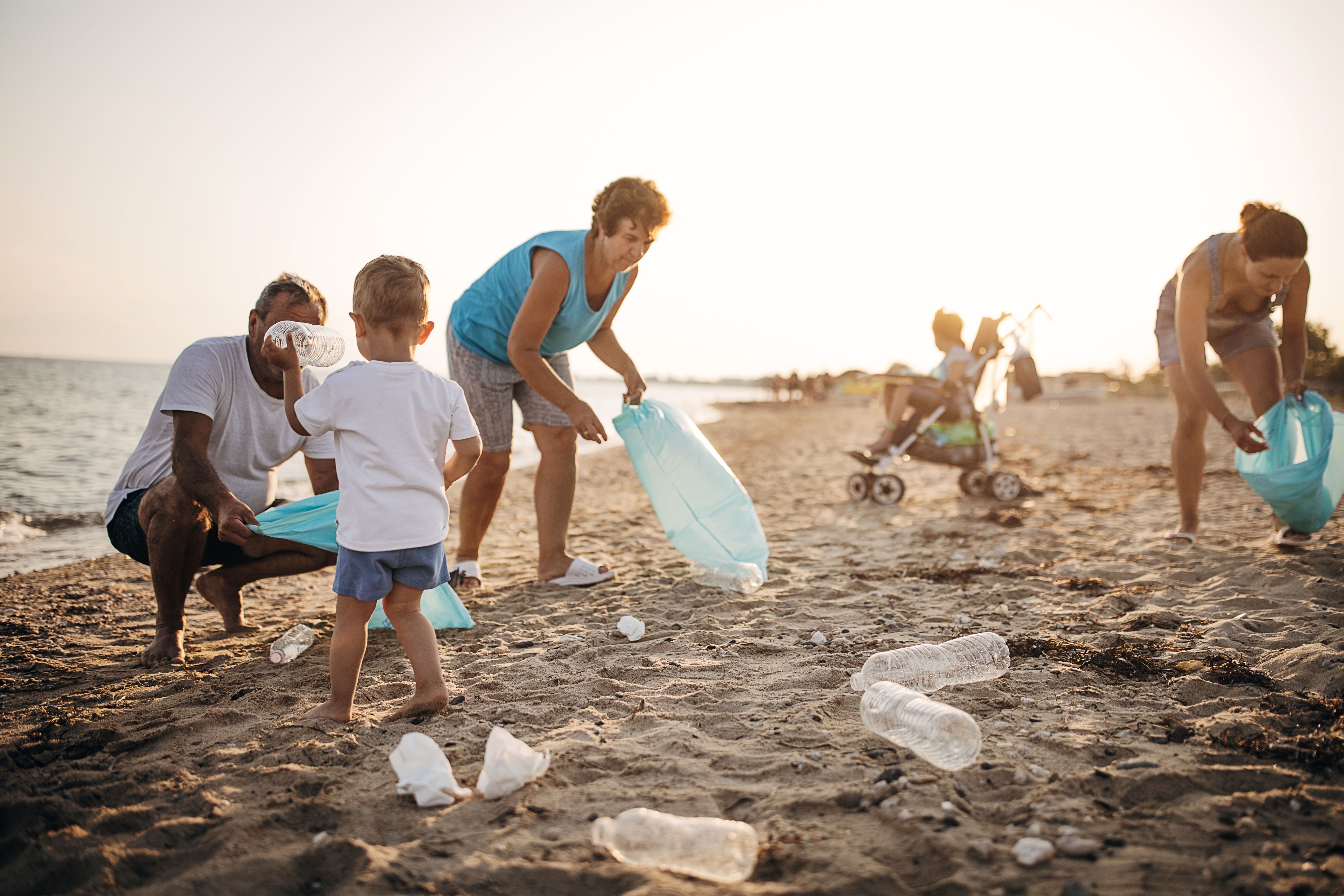 family cleaning beach