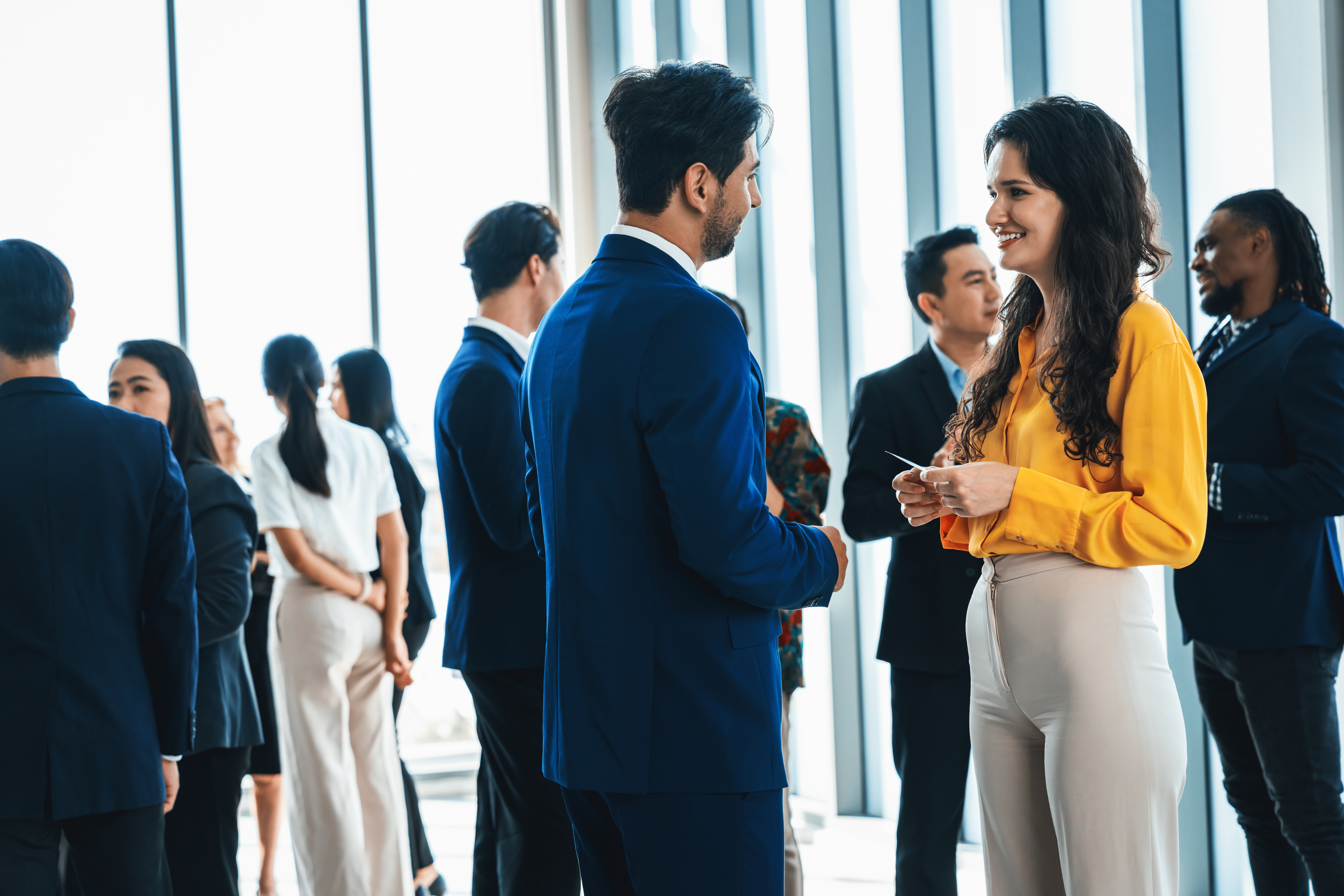Businessman talking to female leader about financial project. Intellectual.