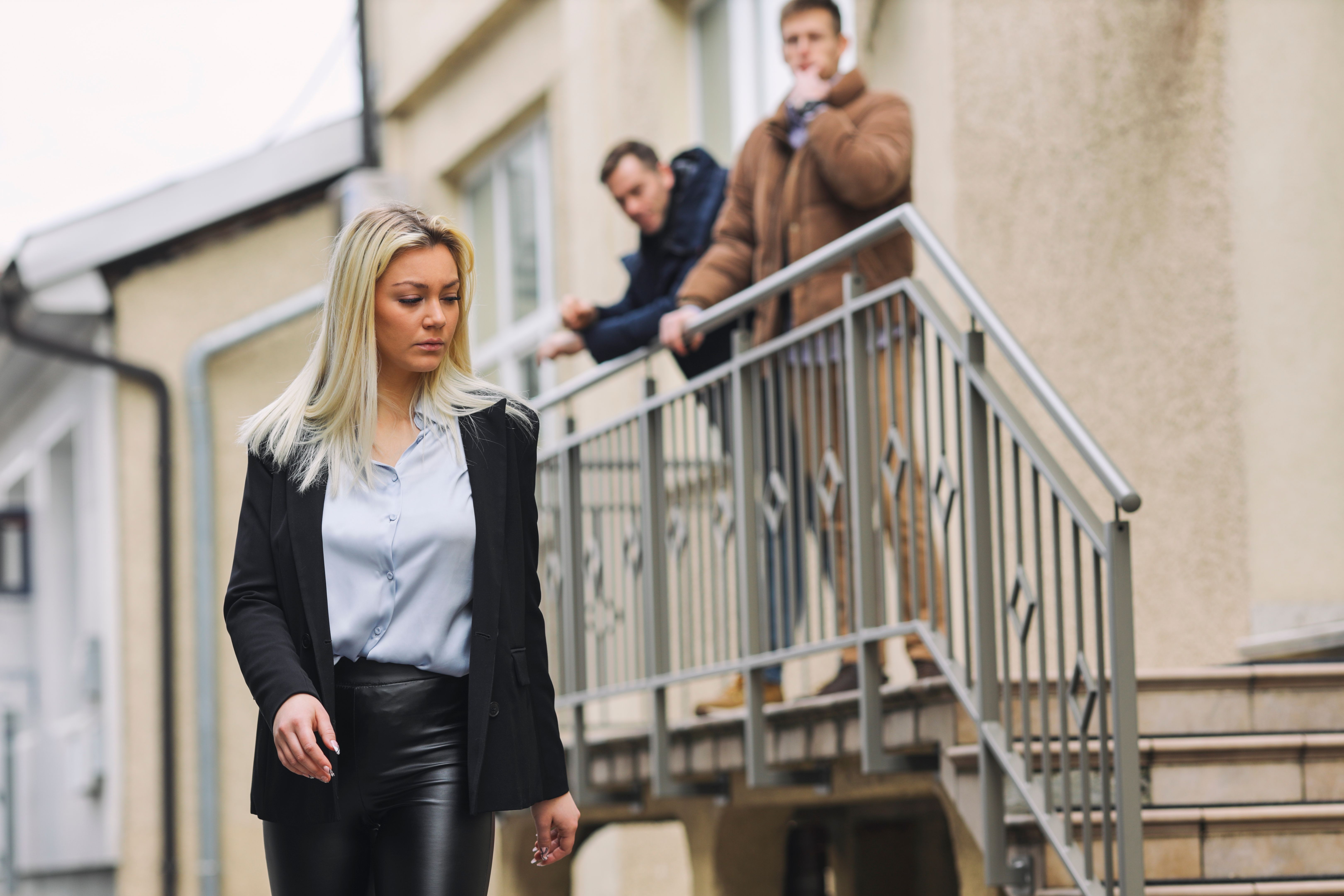 Woman getting attention on city street