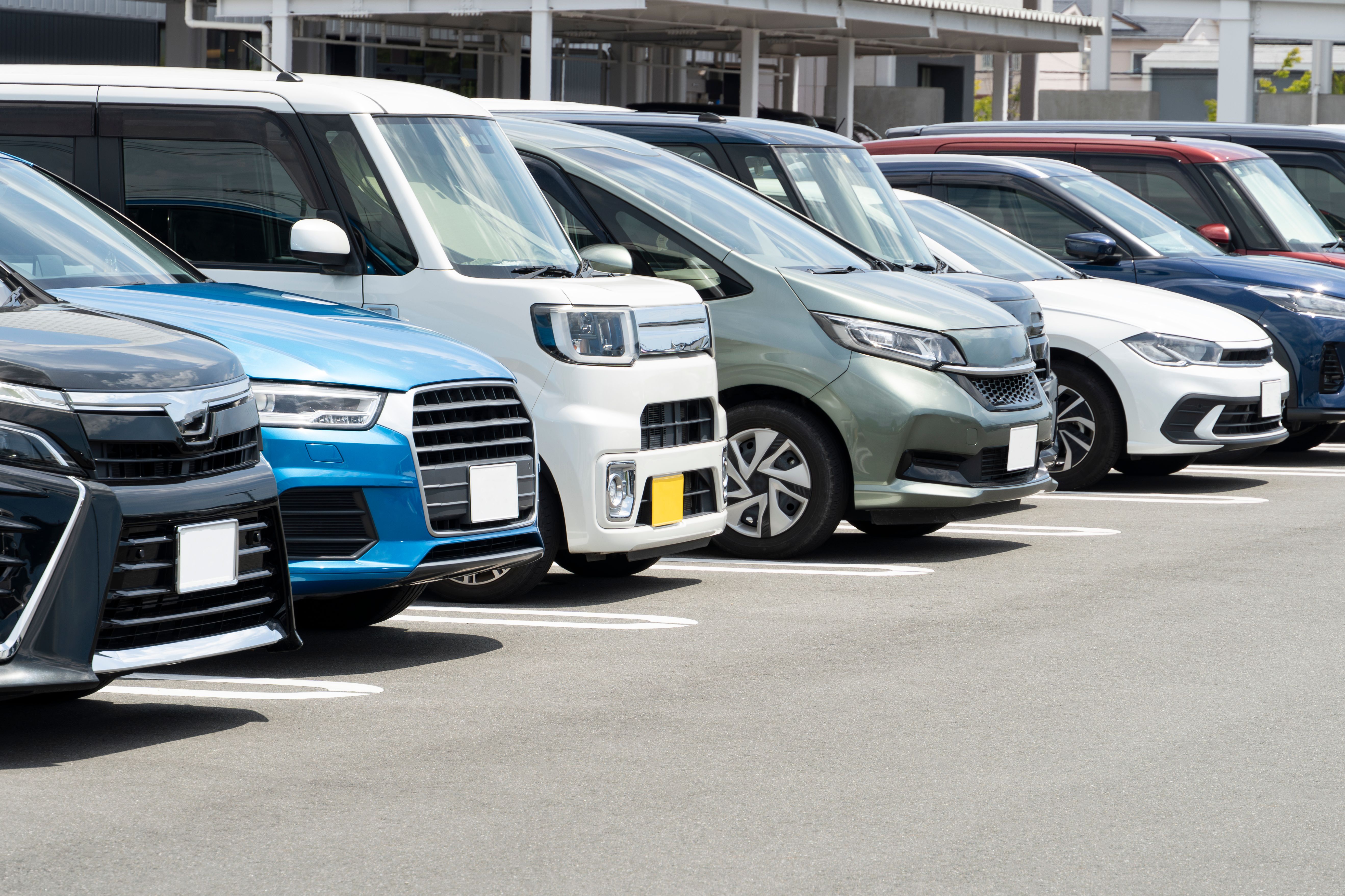 Cars lined up in a parking lot