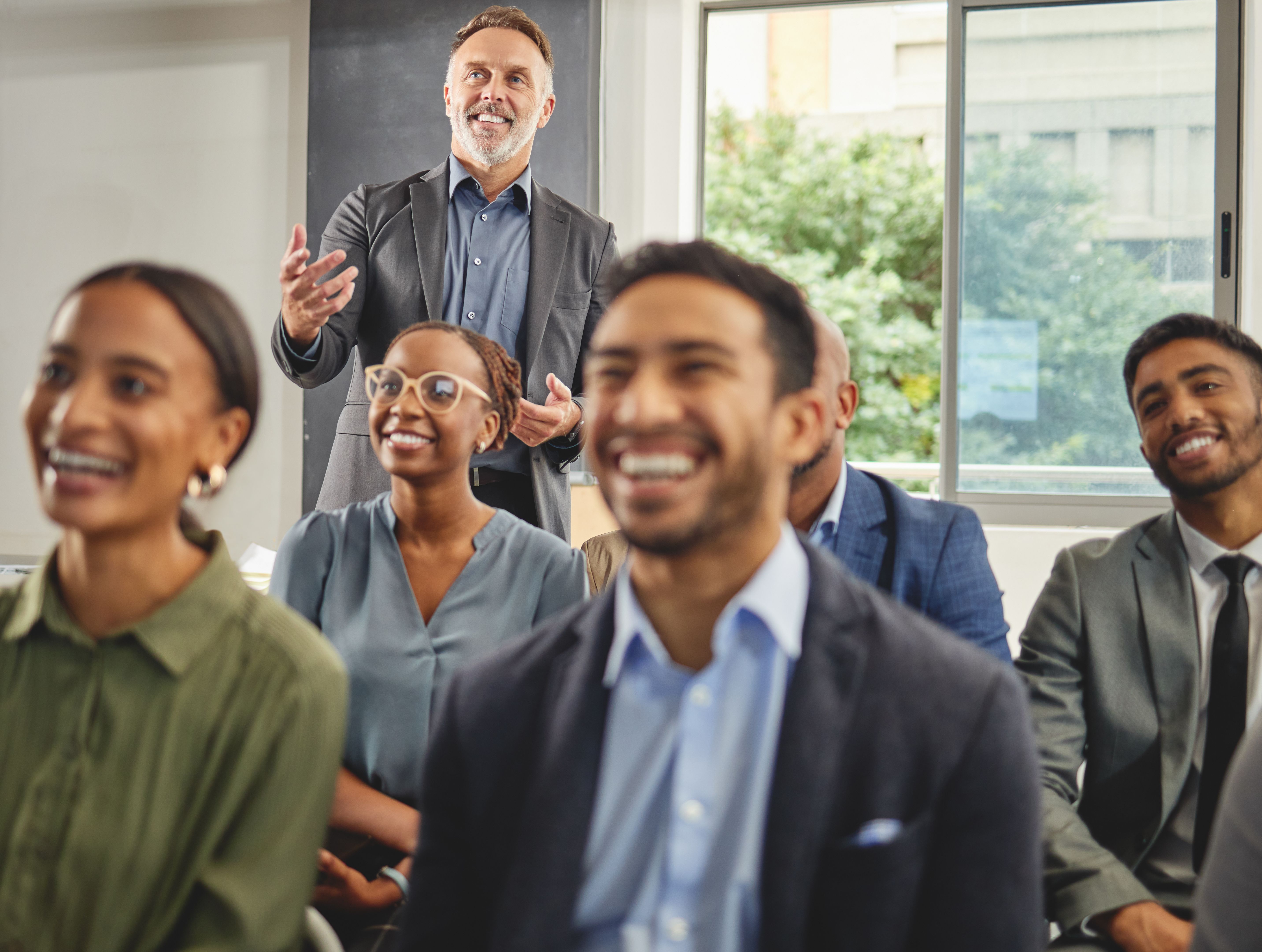 Shot of a group of businesspeople having a meeting in a boardroom at work Shot of a group of businesspeople having a meeting in a boardroom at work