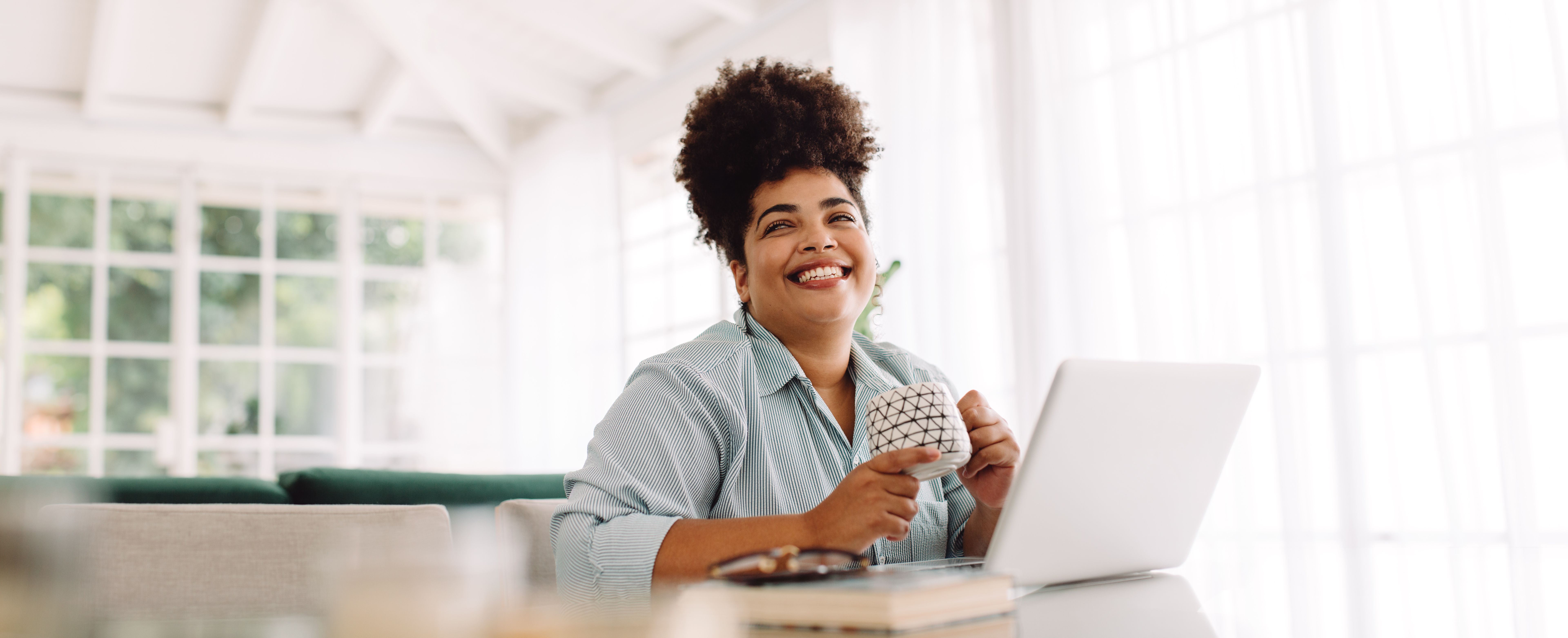 Woman taking break while working from home Woman taking break while working from home