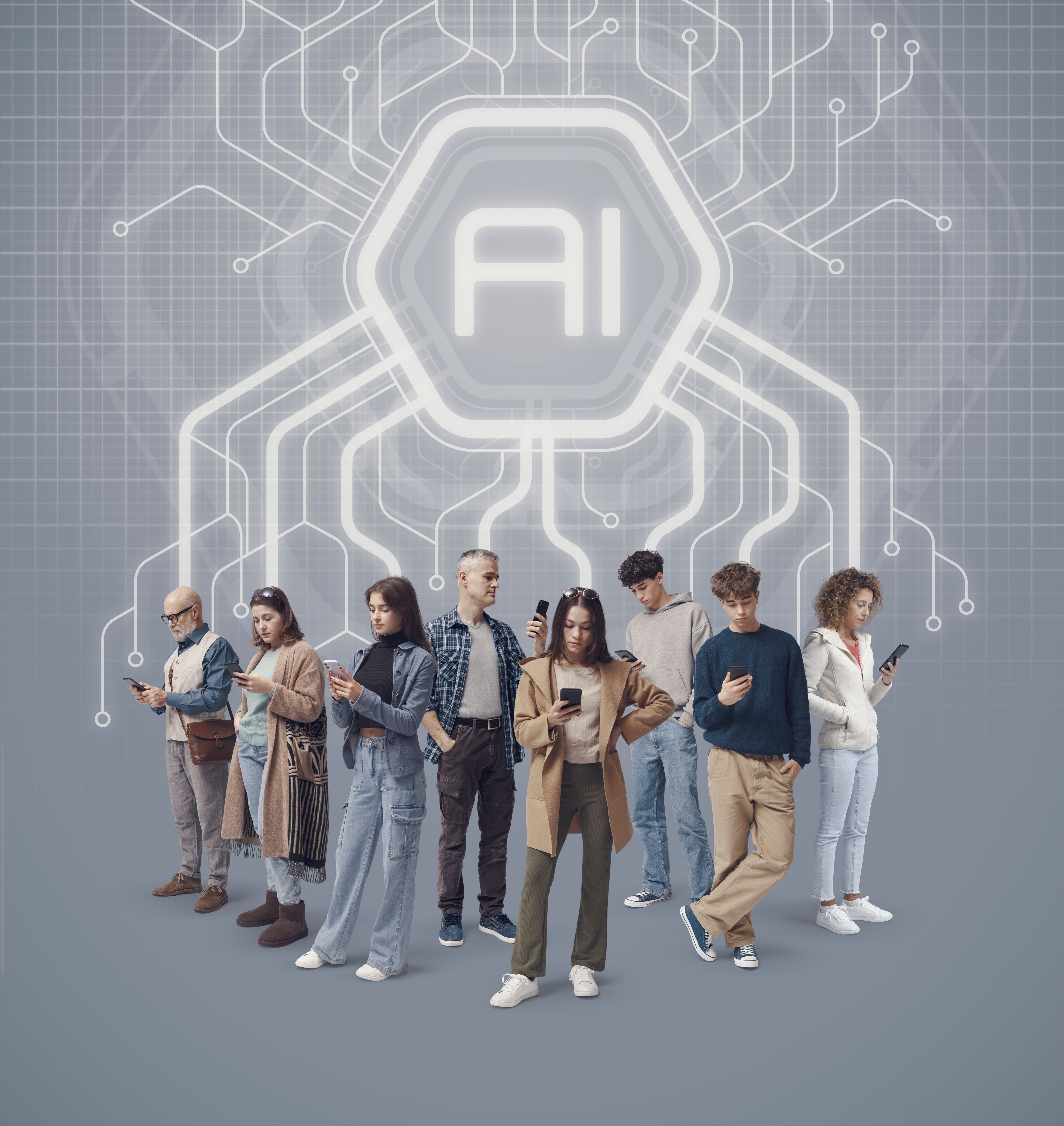 Group of ordinary people of mixed ages standing checking their smartphones