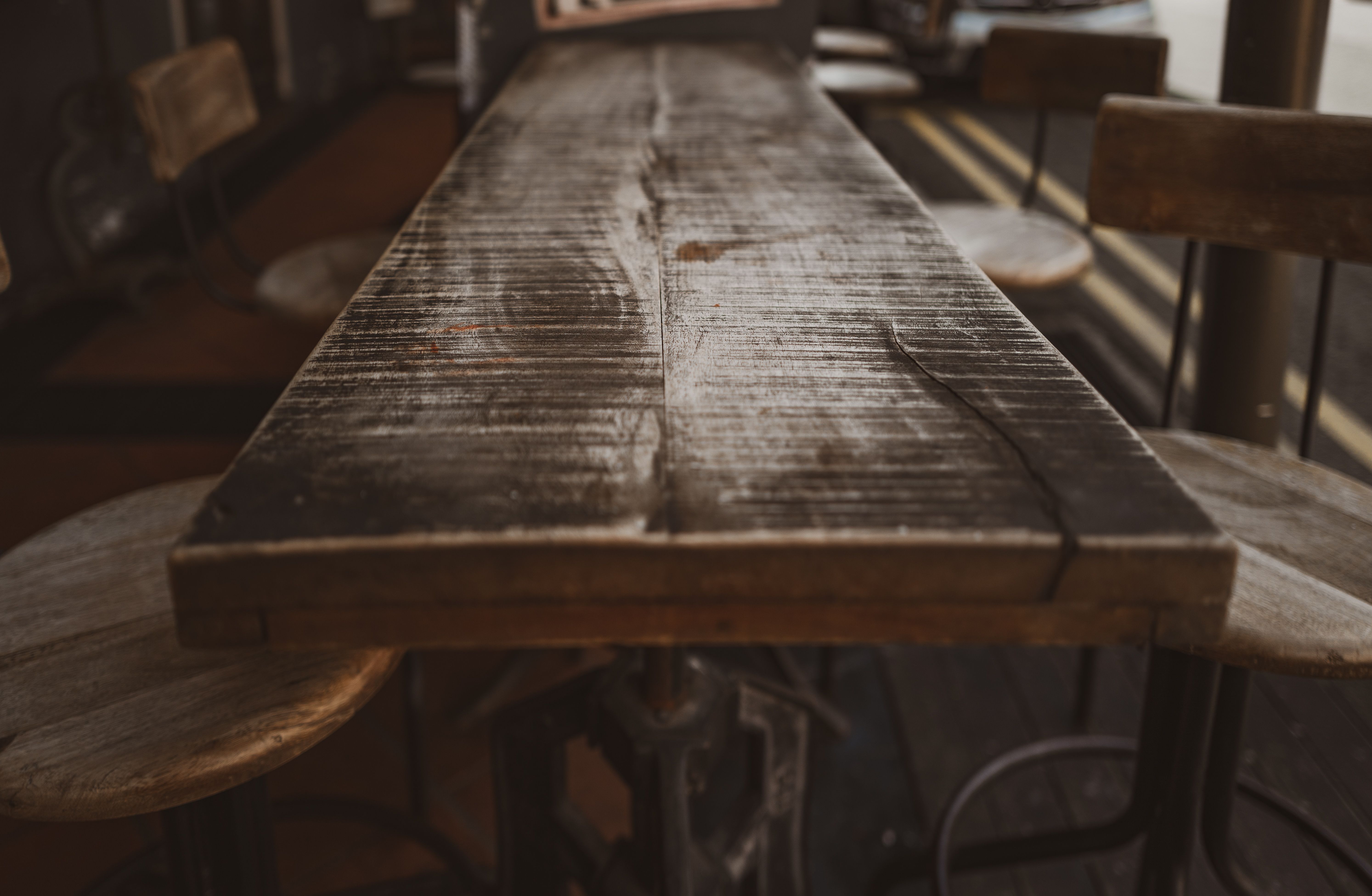 Wooden long table and chairs