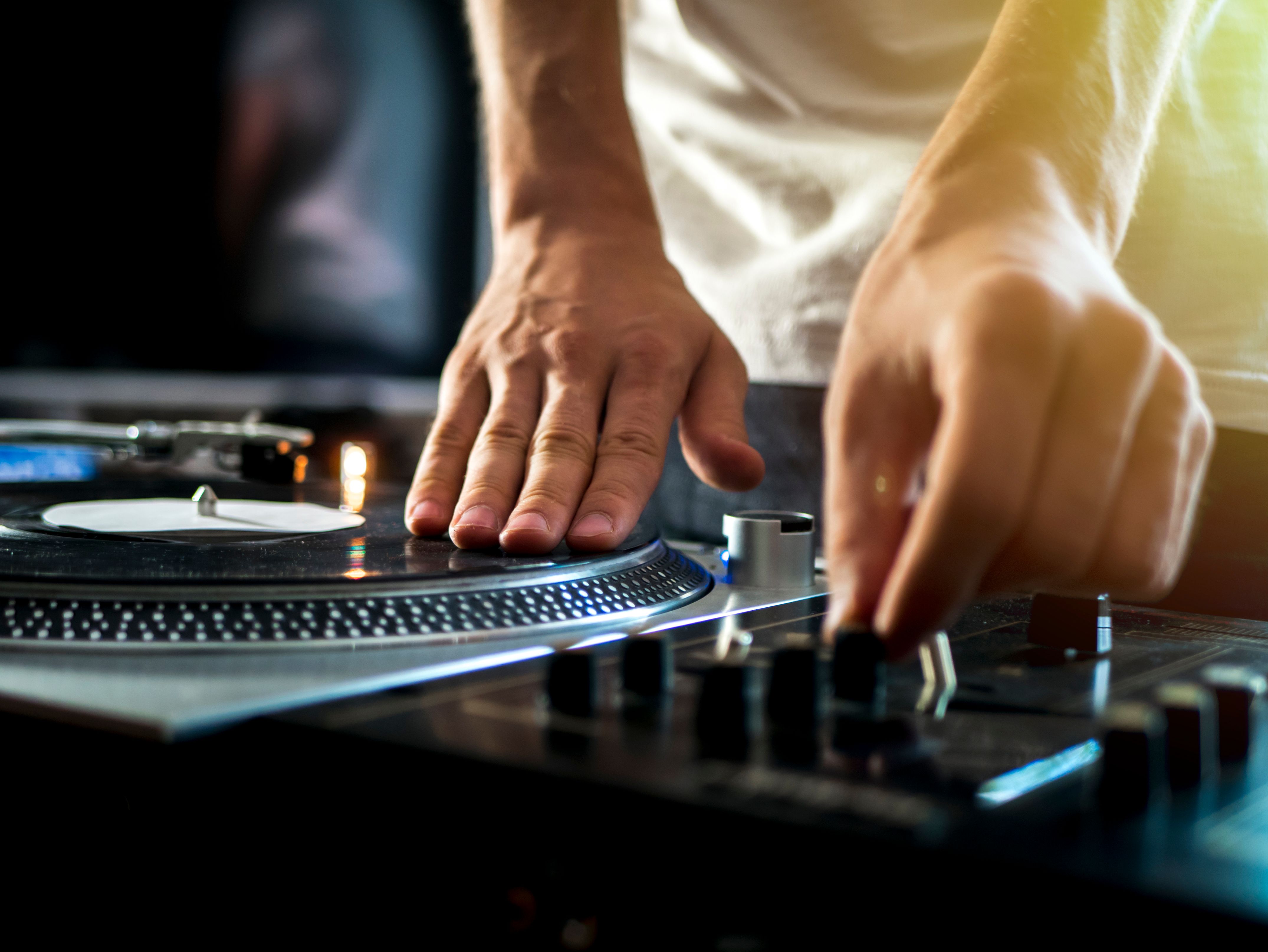 dj hands on professional music equipment deck vinyl record turntable and timecode dj hands on professional music equipment deck vinyl record turntable and timecode