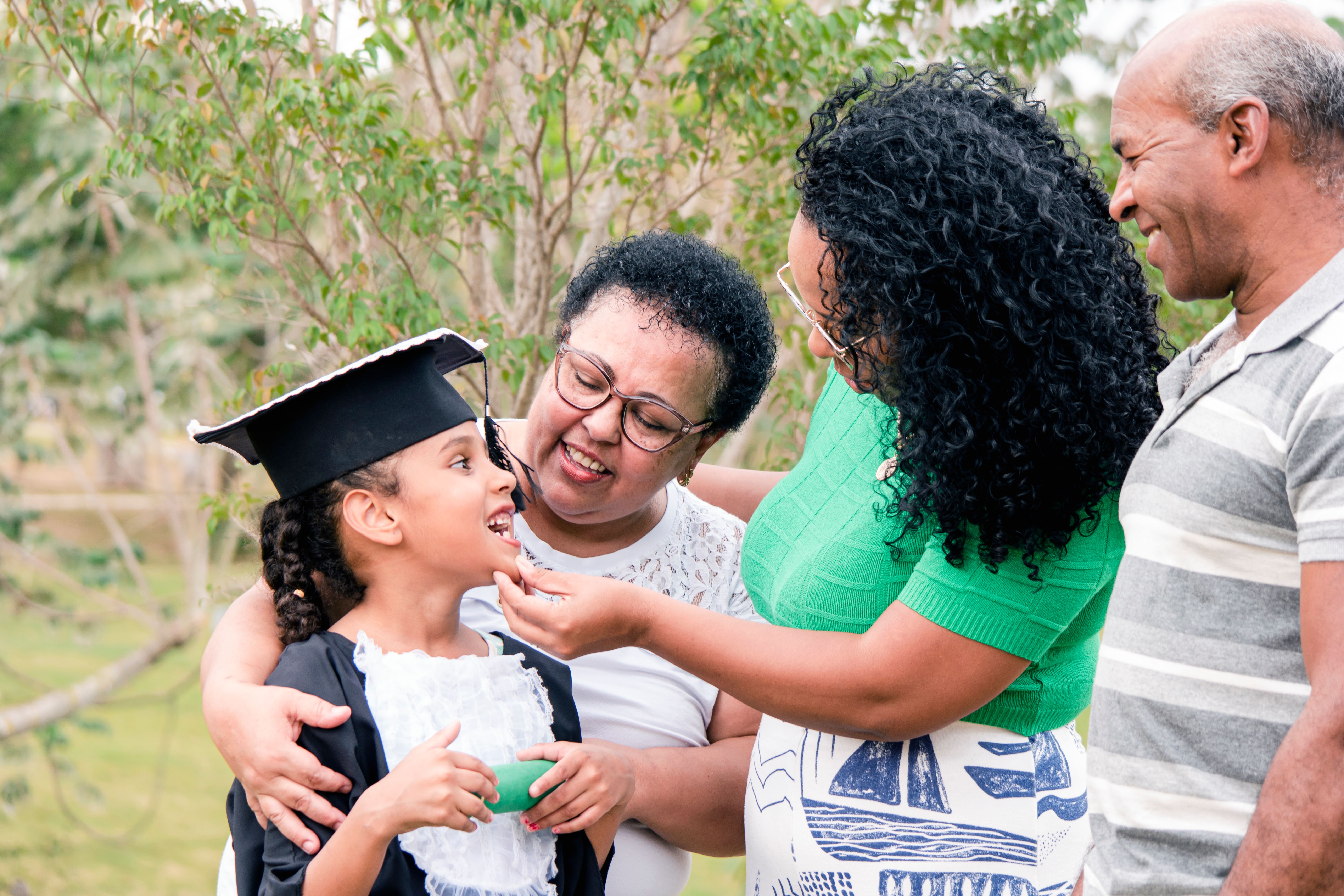 Family in the preschool graduation cerimony