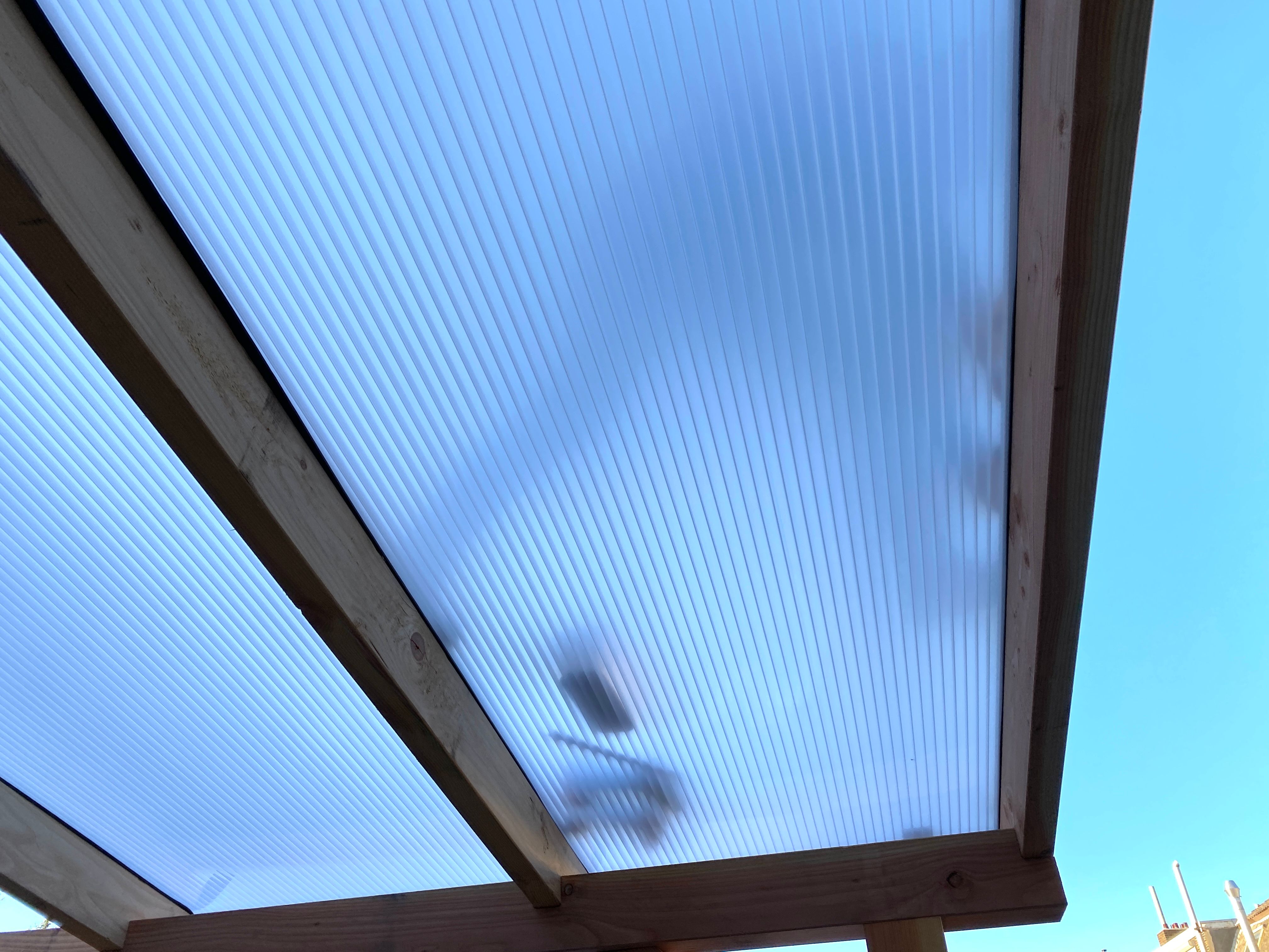 Roofer in silhouet at work