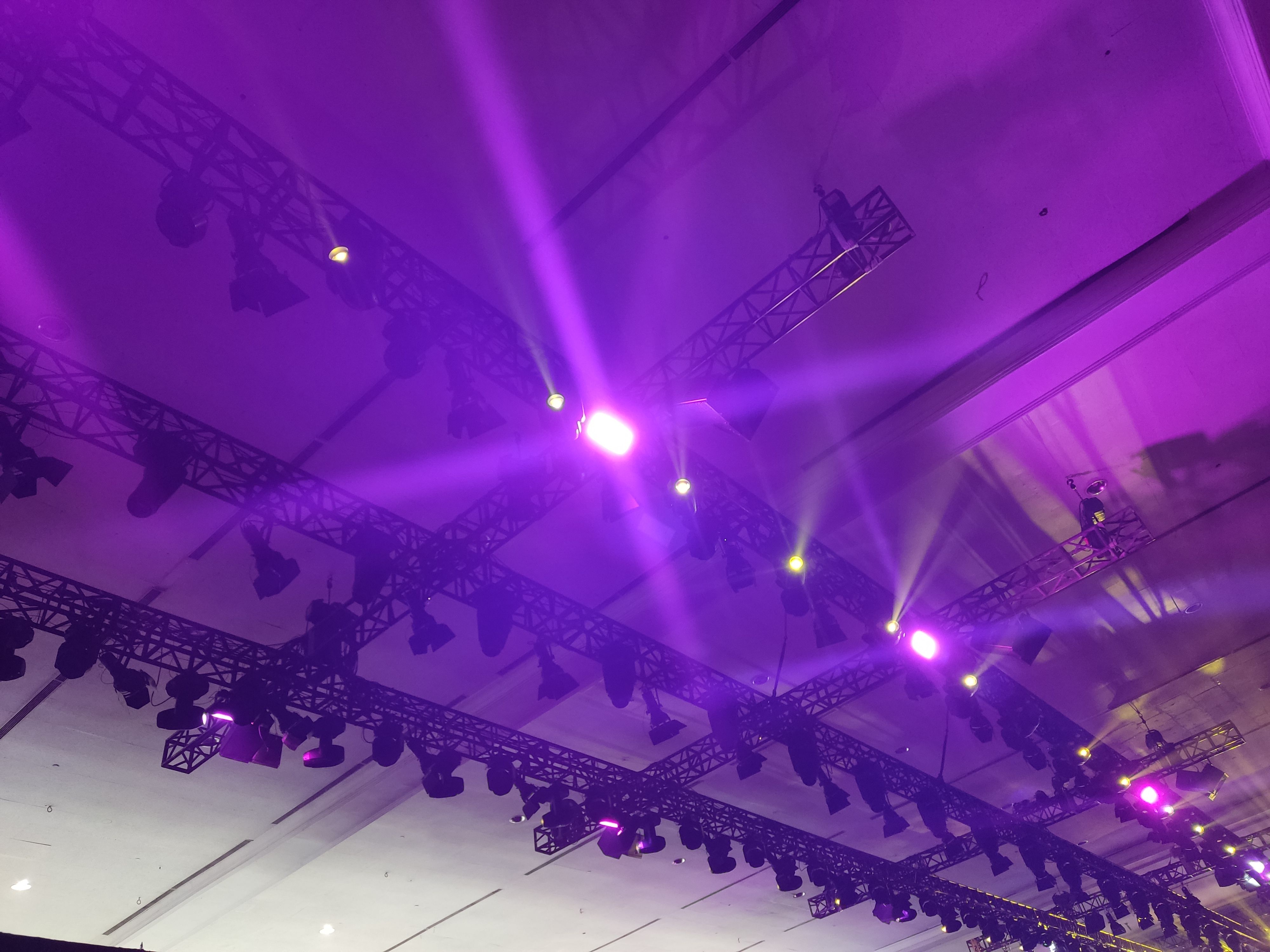 Purple color Lighting and camera setup on exhibition ceiling fashion show