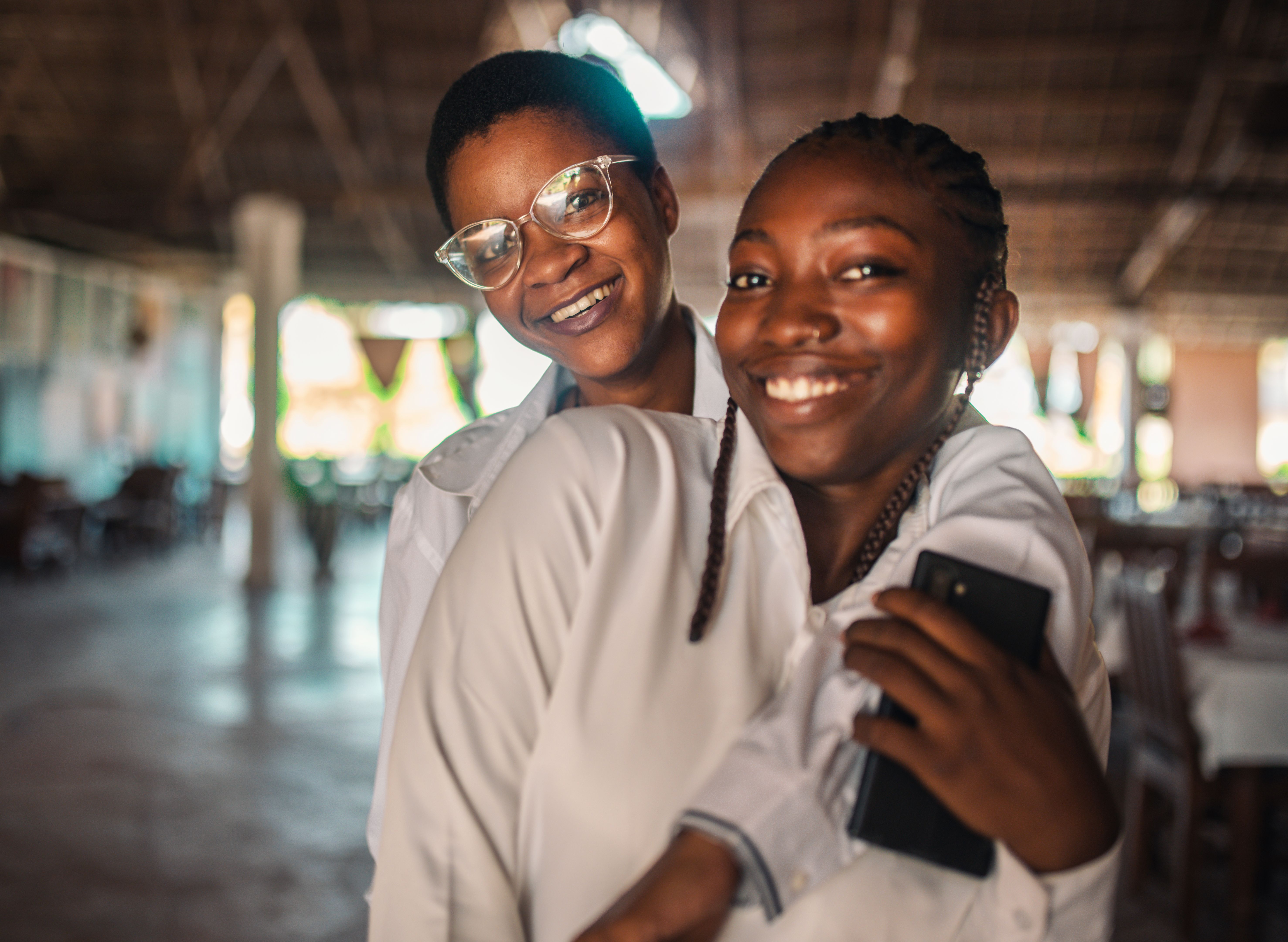portrait of two pretty black teenager