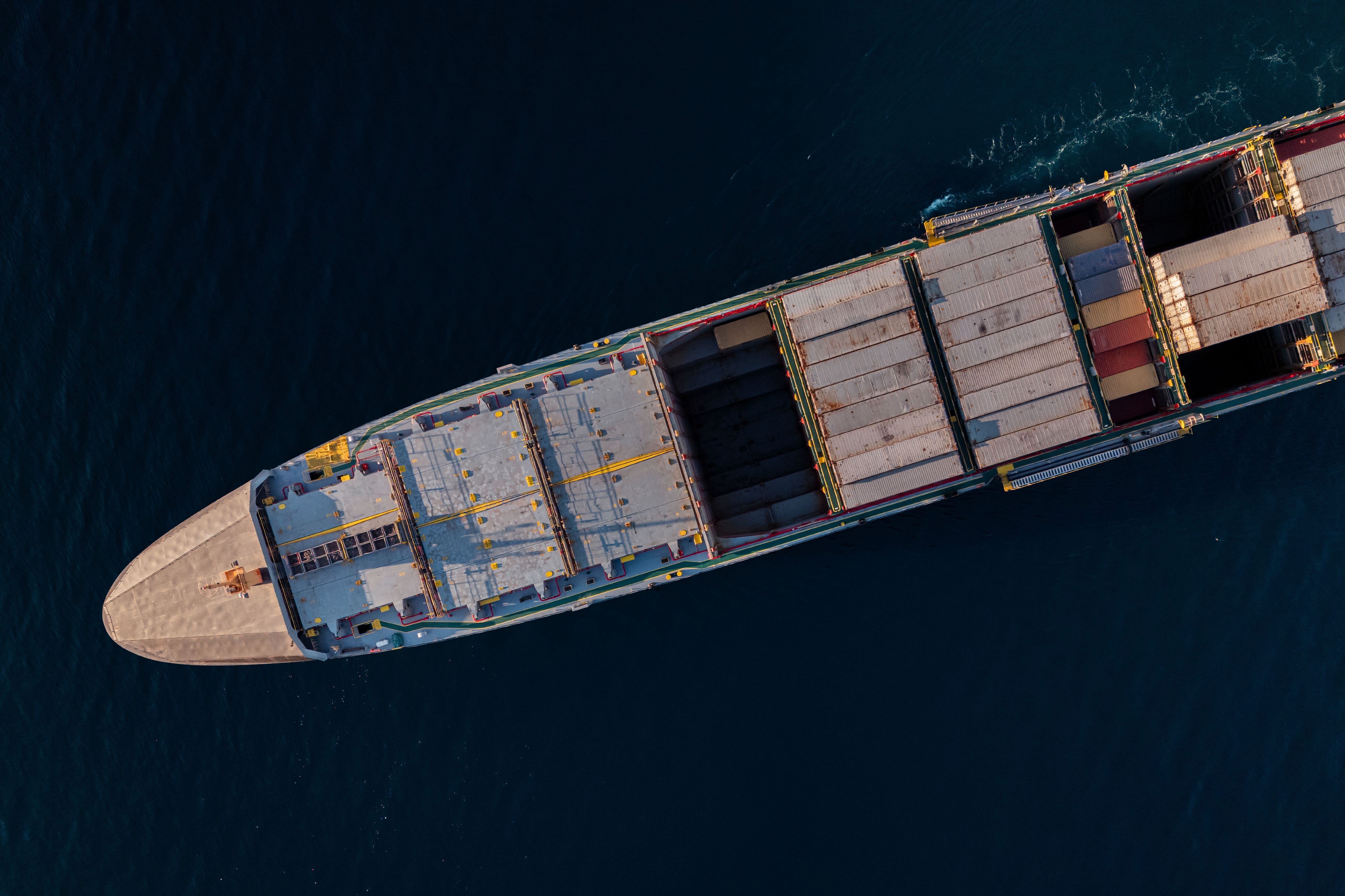Cargo Ship Sailing on Calm Open Sea