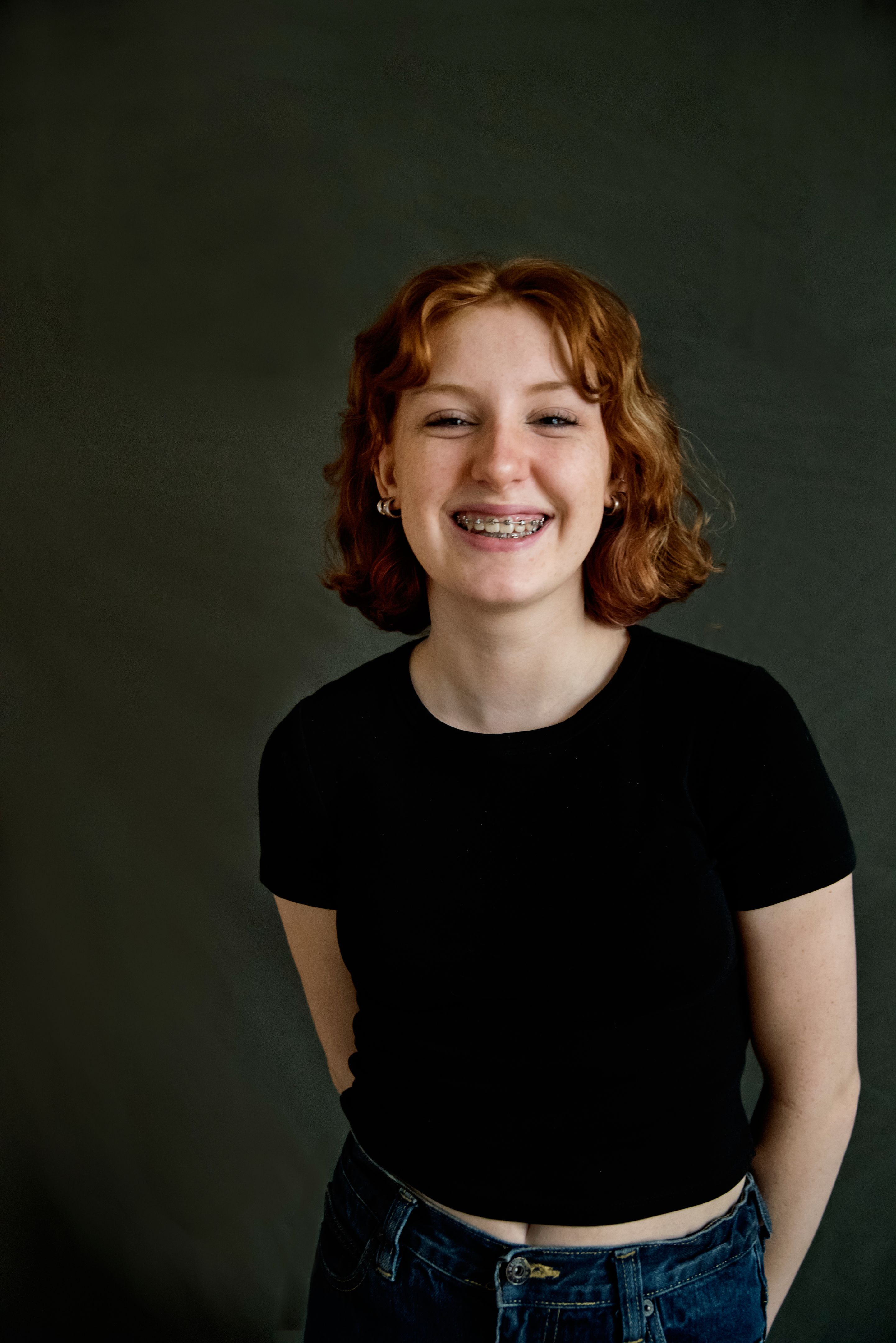 smiling person with braces