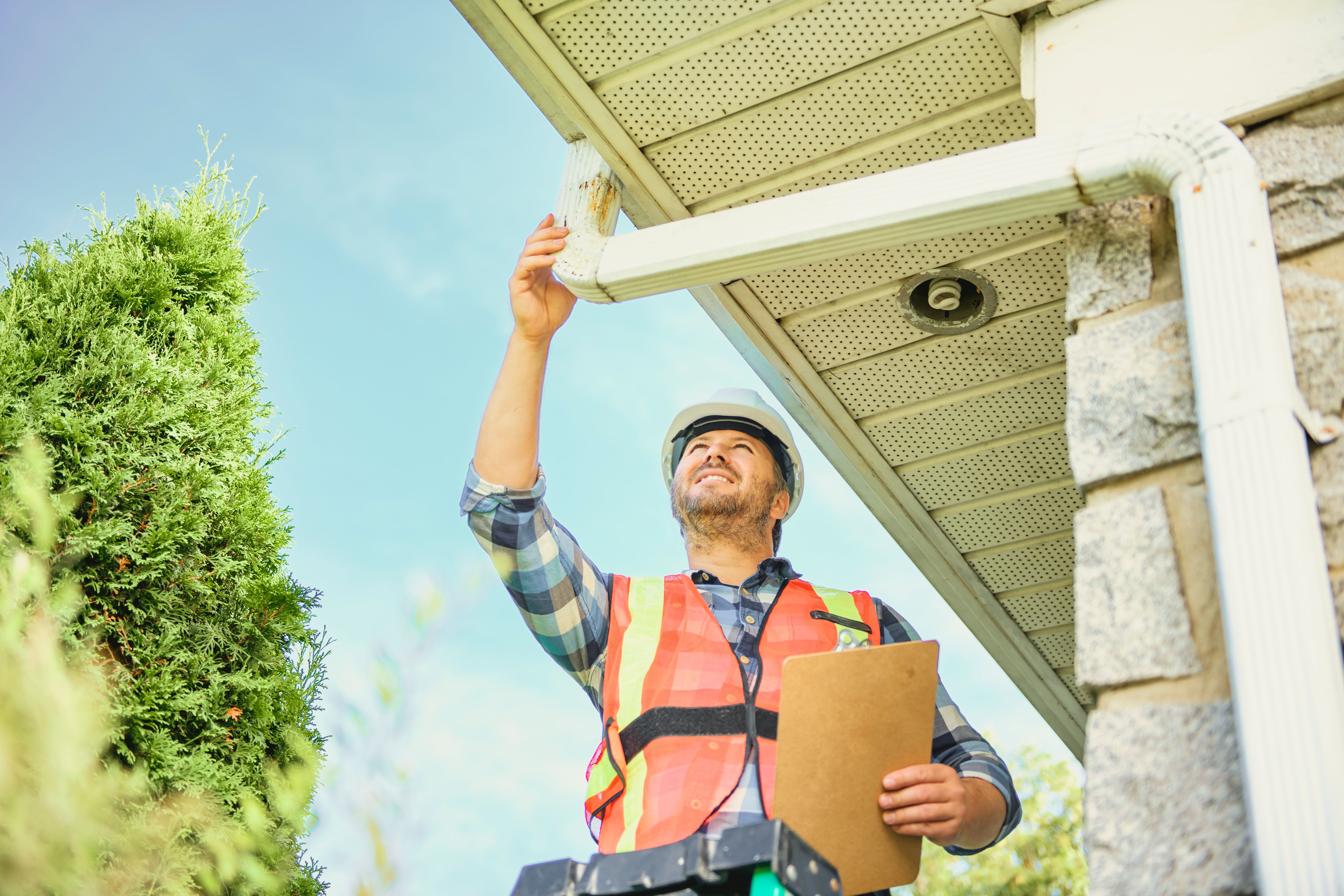 inspecting gutters