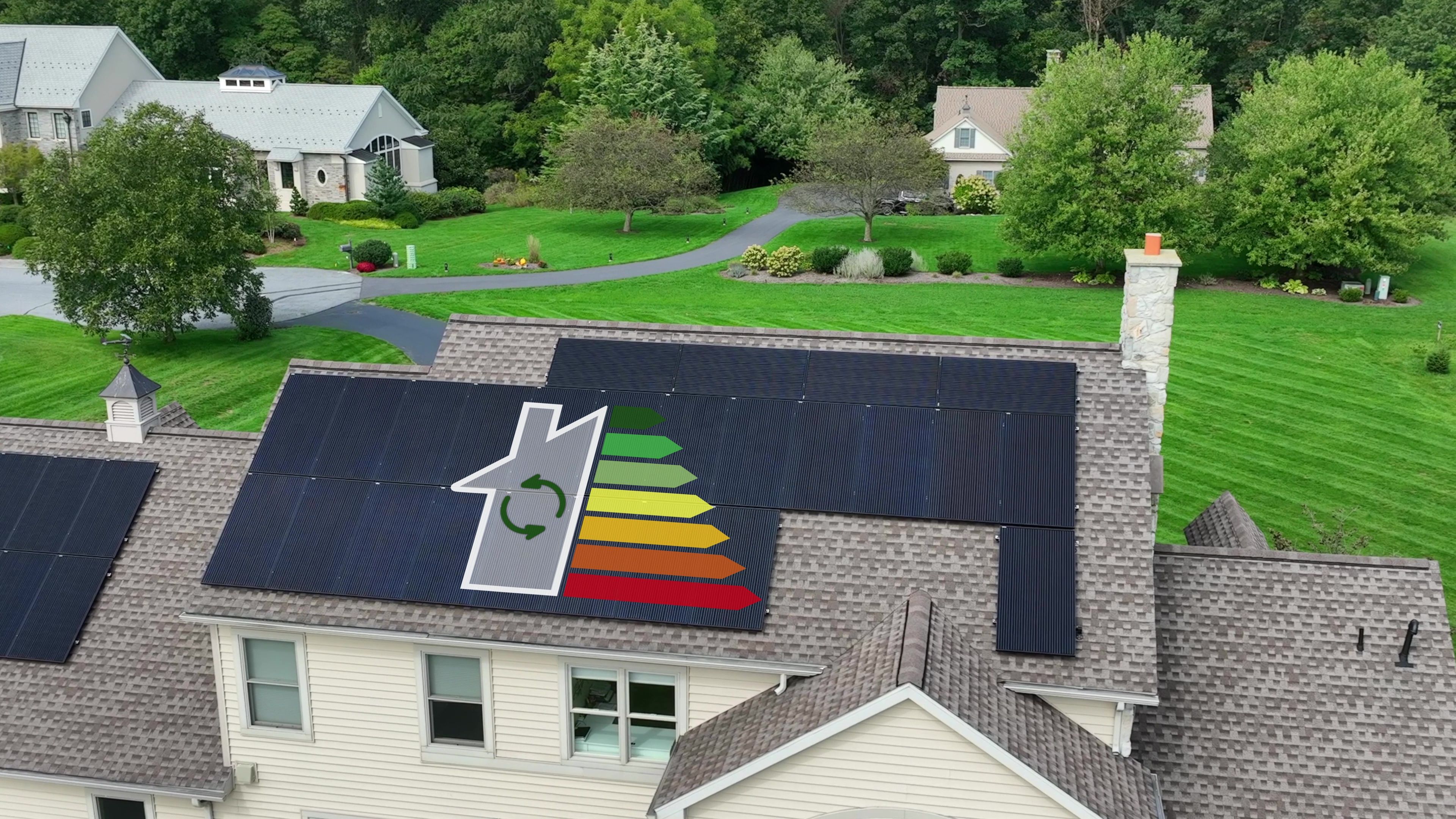 House with solar panels and energy rating graphic on roof. Large home in USA neighborhood with efficient renewable energy source. Aerial
