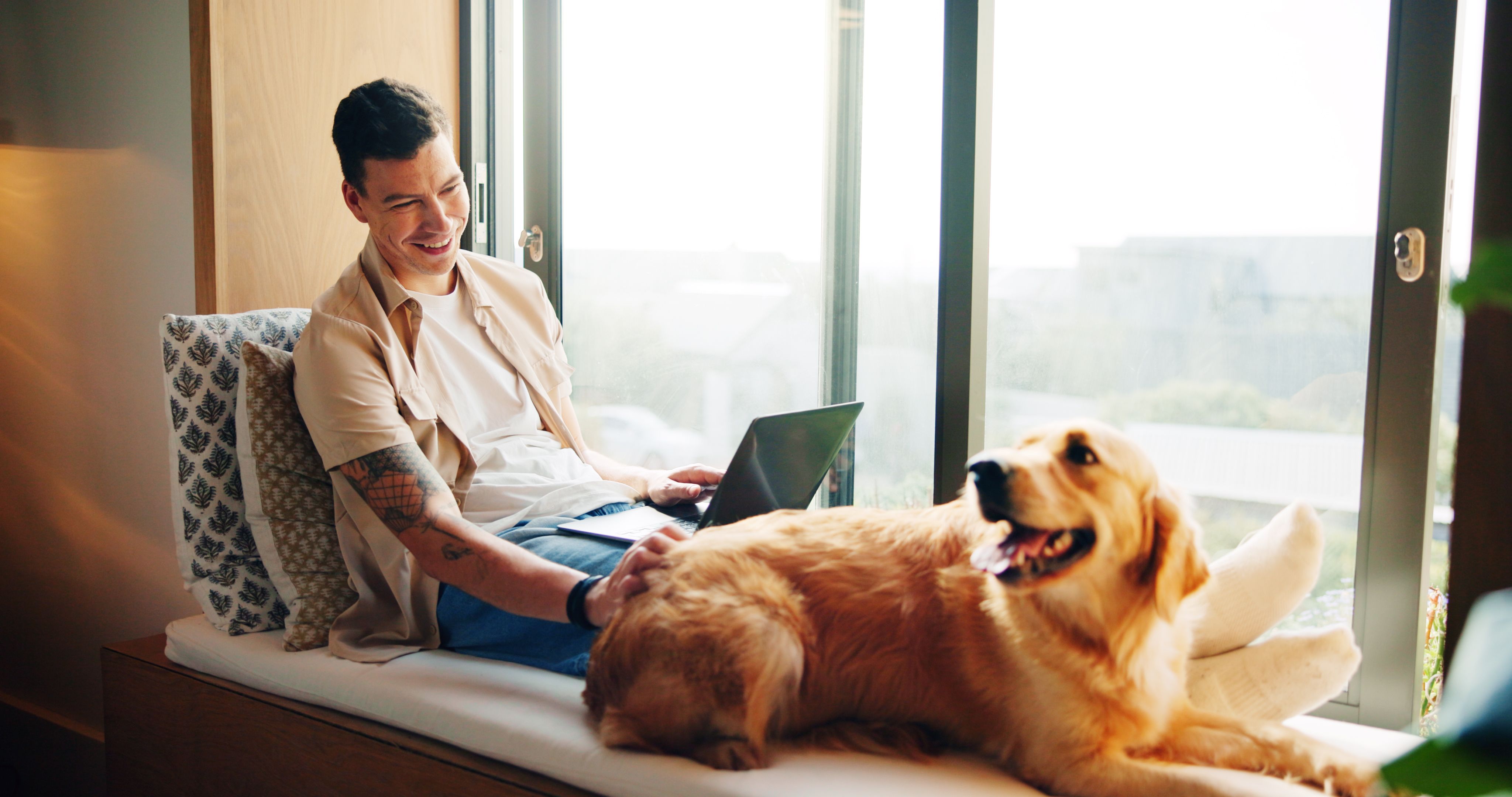 pet owner with laptop
