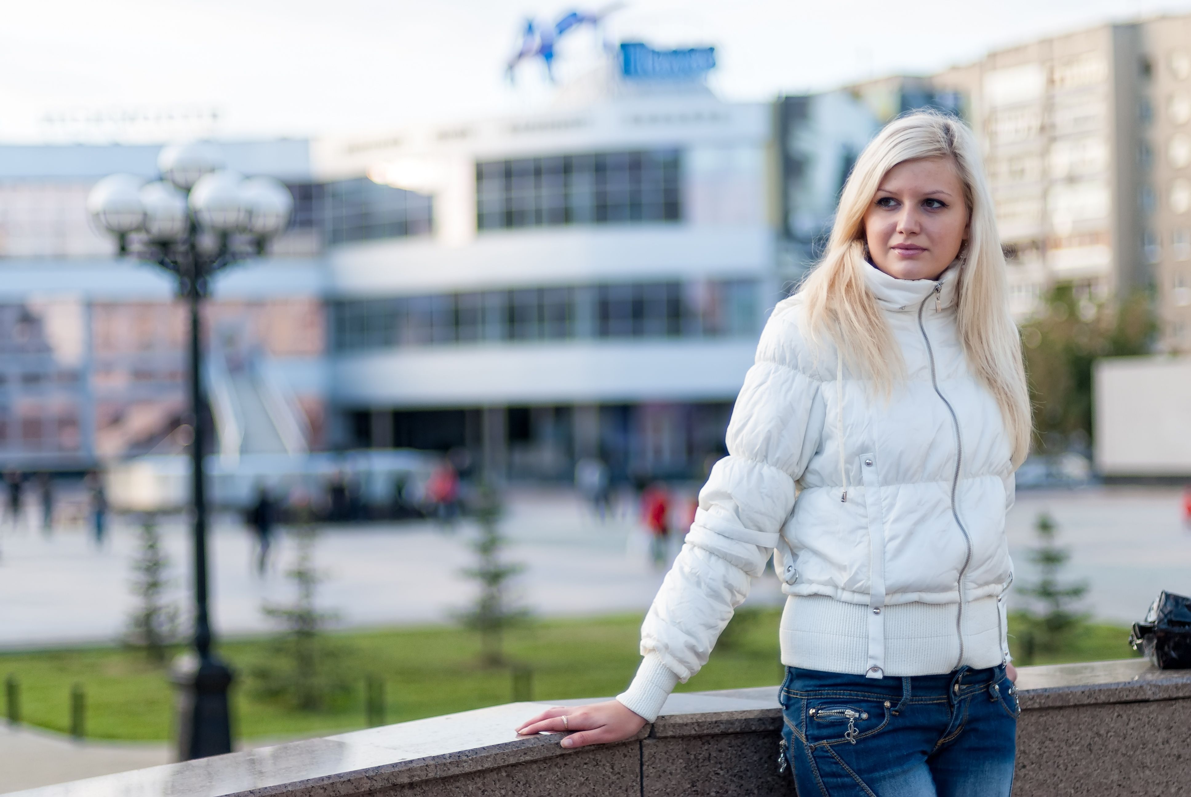 Blond woman over urban background Blond woman over urban background