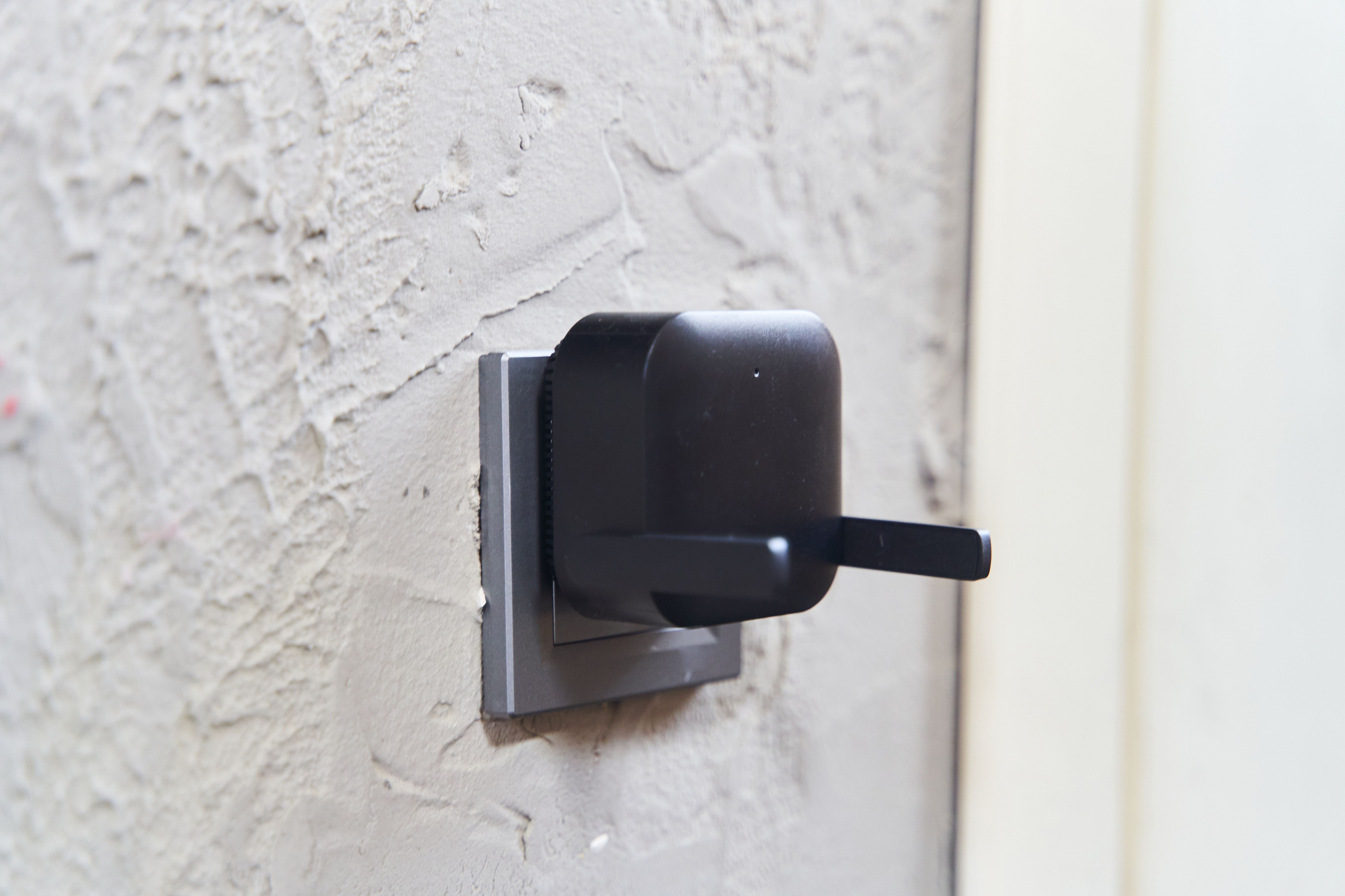 Black wifi signal booster on white background. Wifi connection. Wifi transmitter, router Black wifi signal booster on white background. Wifi connection. Wifi transmitter, router