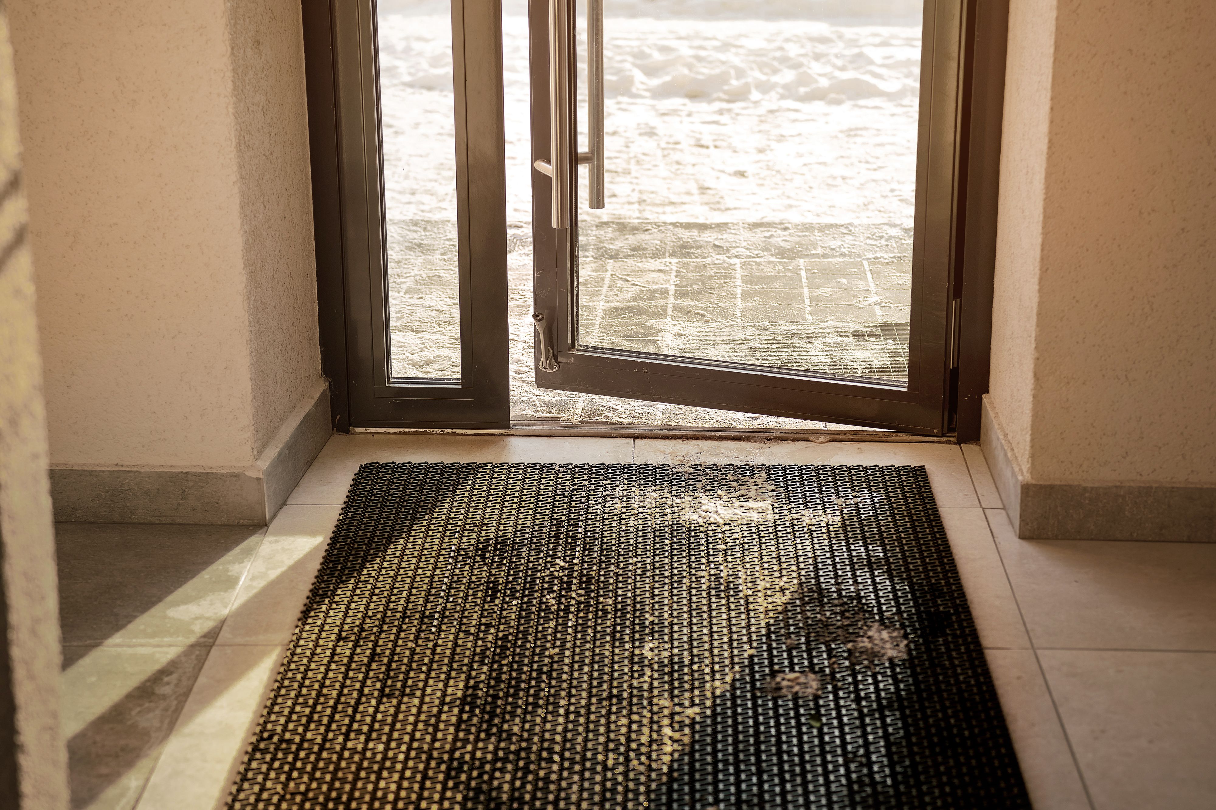 cleaning outdoor mat