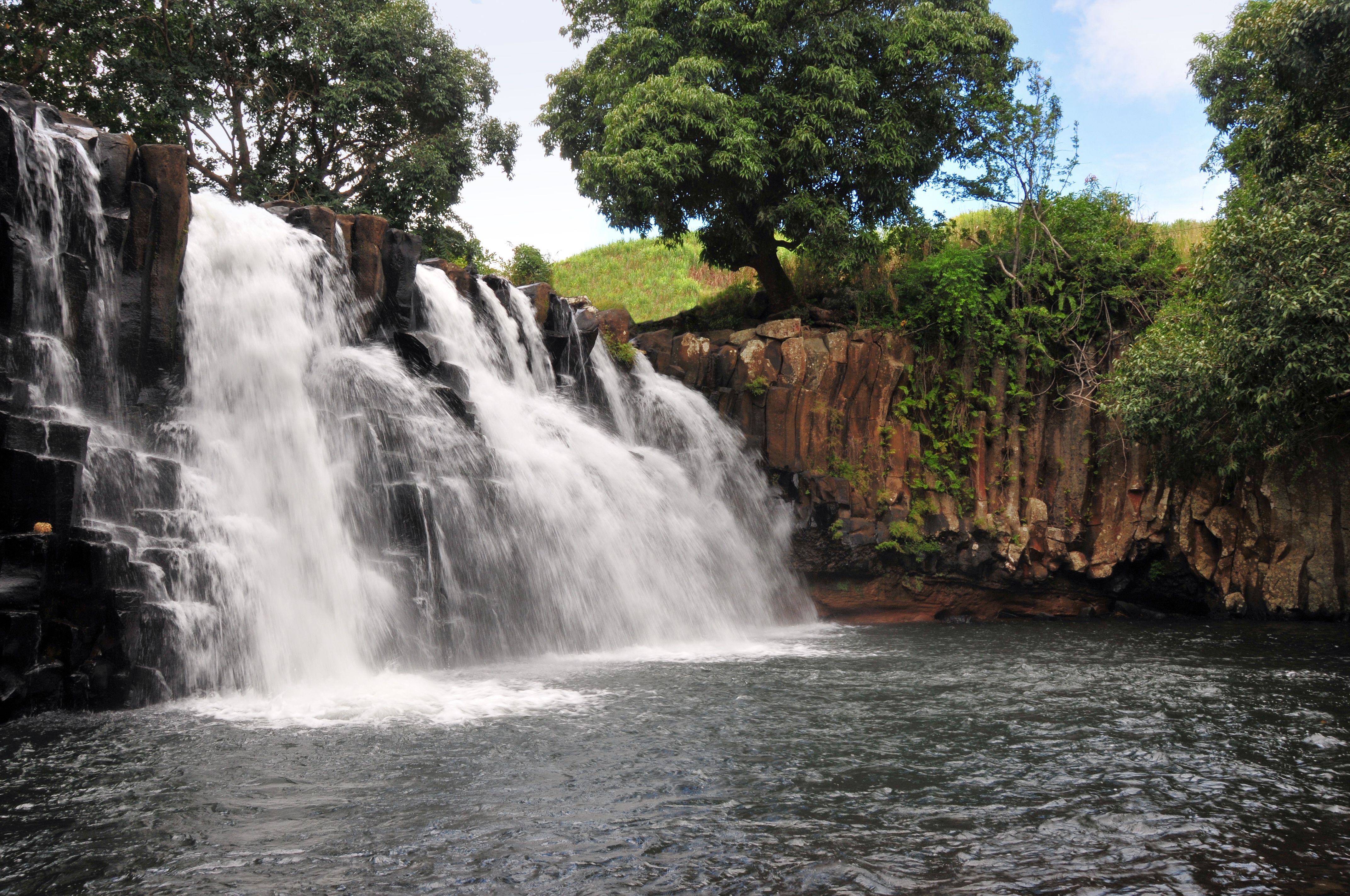 Rochester Falls on the Savanne River with sugarcane fields in the background, Mauritius