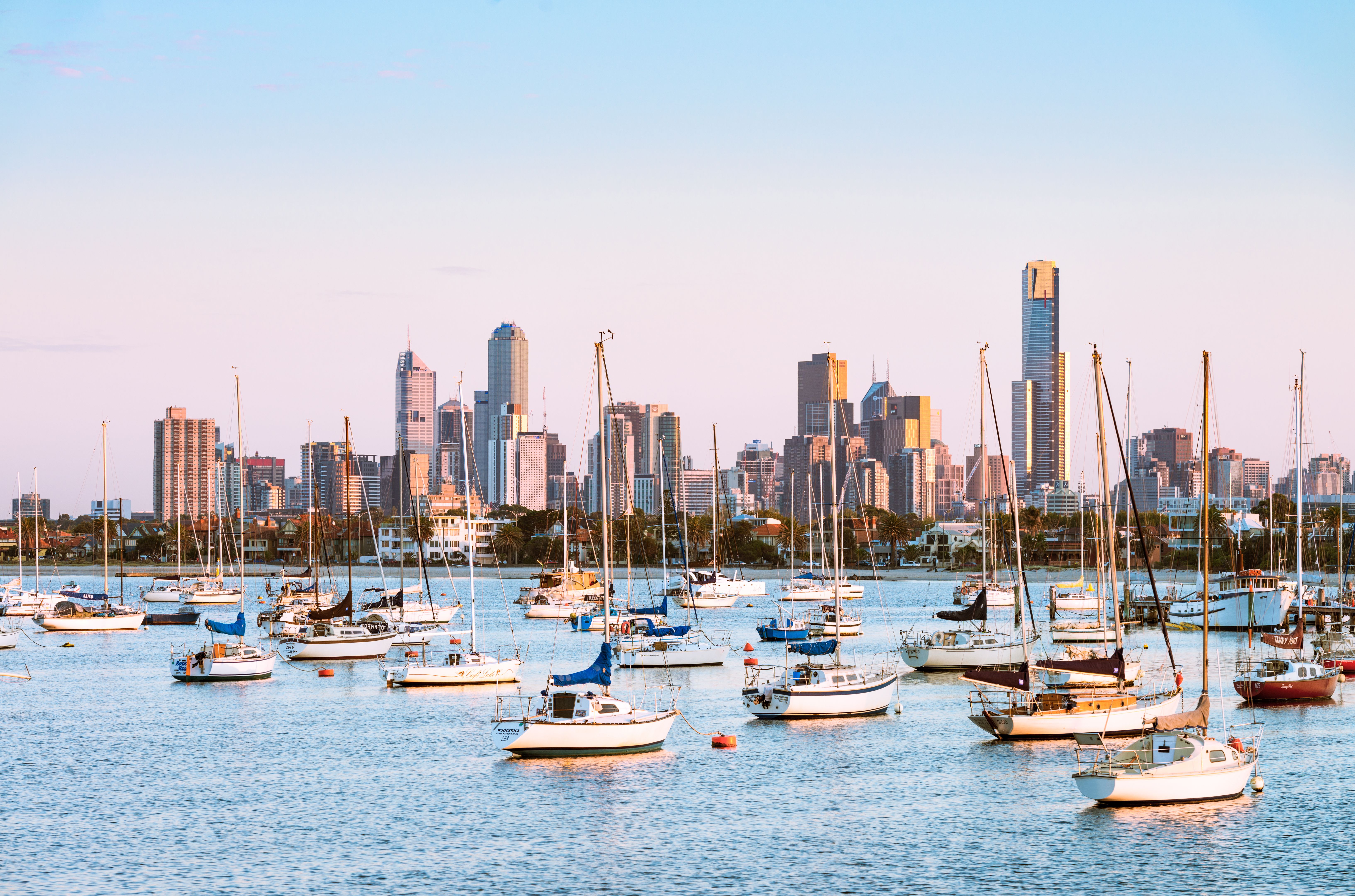 Boats moored in St Kilda, in front of the Melbourne skyline