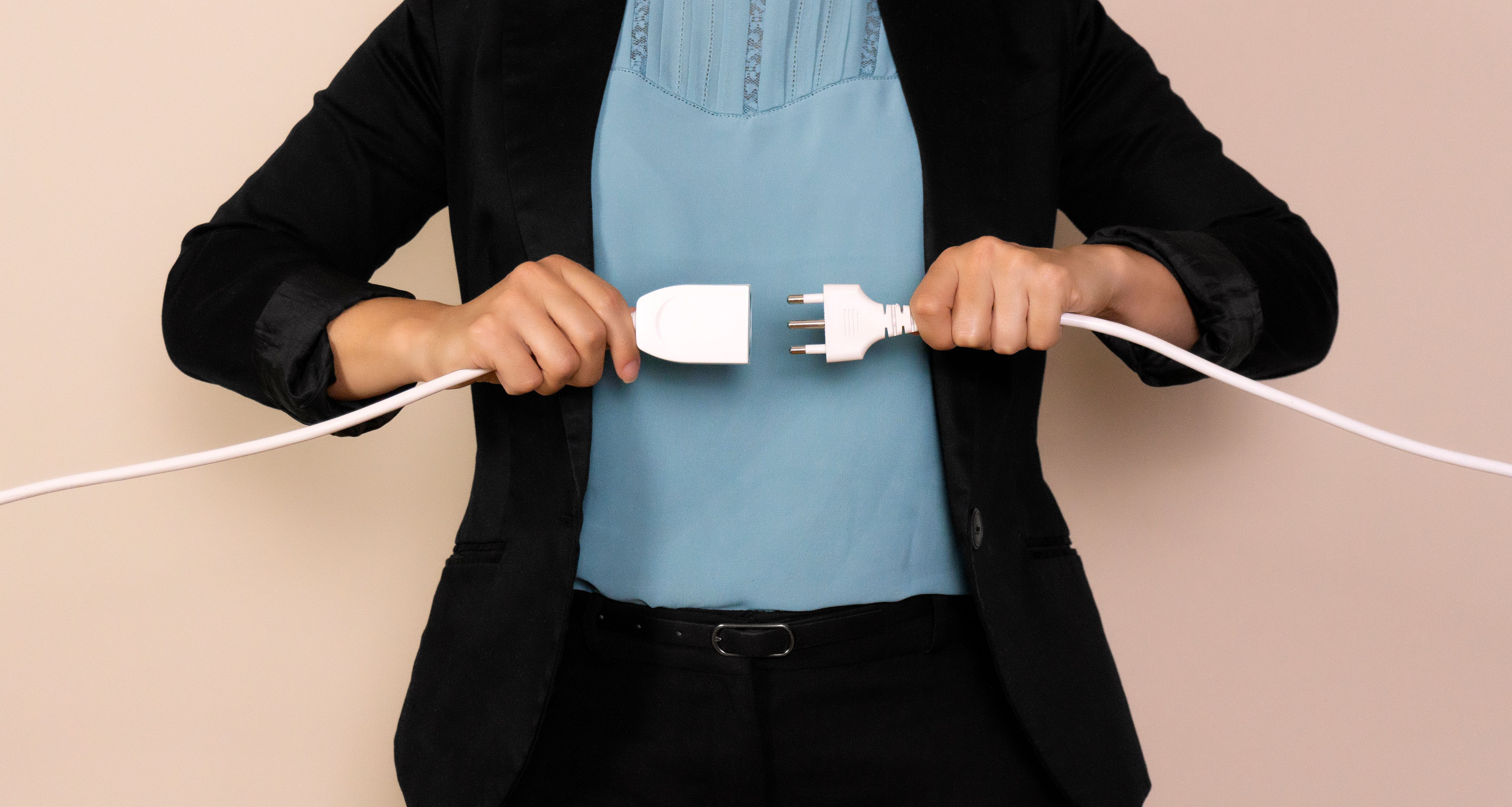 business woman attacks the power outlet