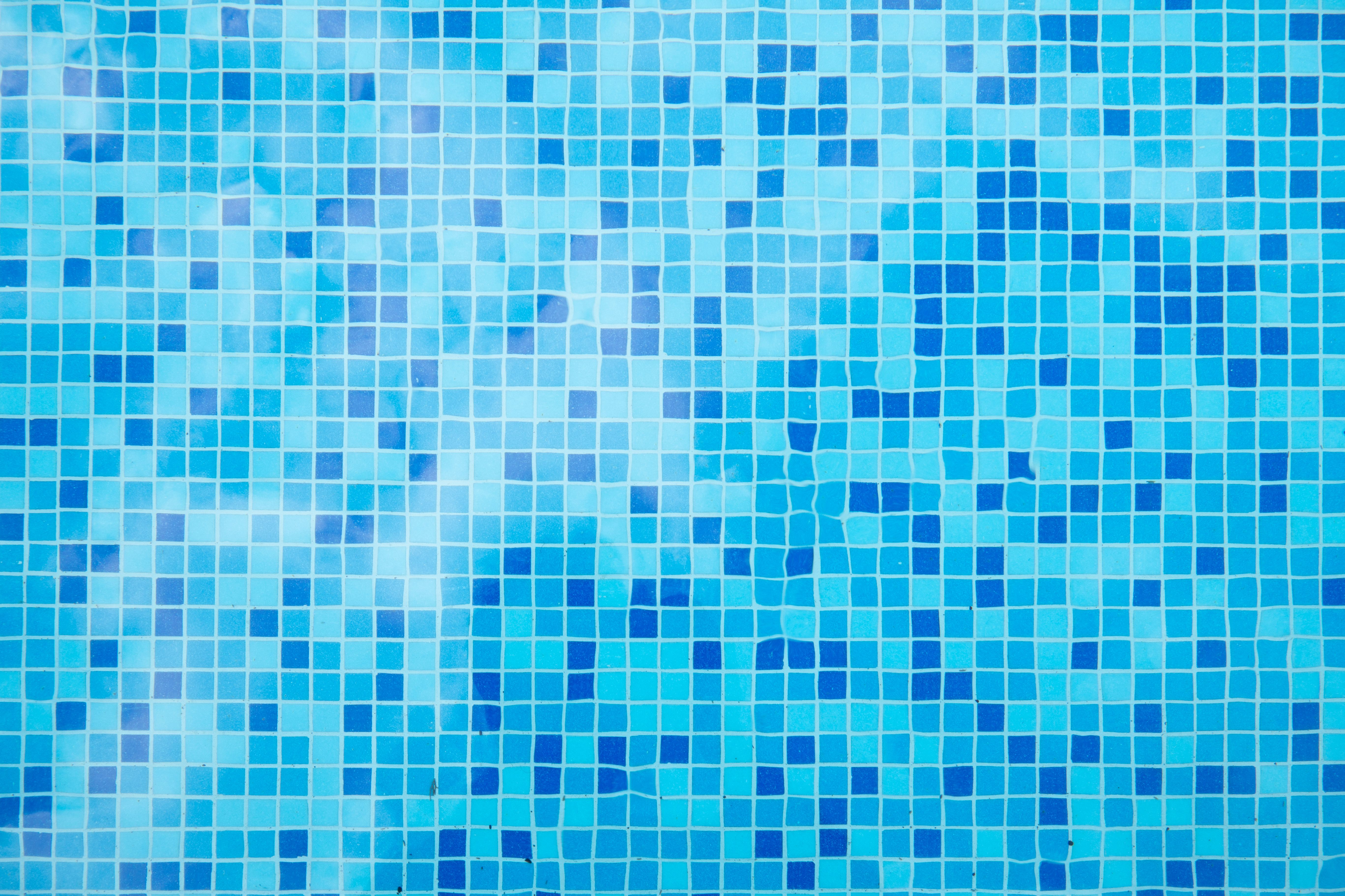 Swimming pool close up view of pattern of tiles