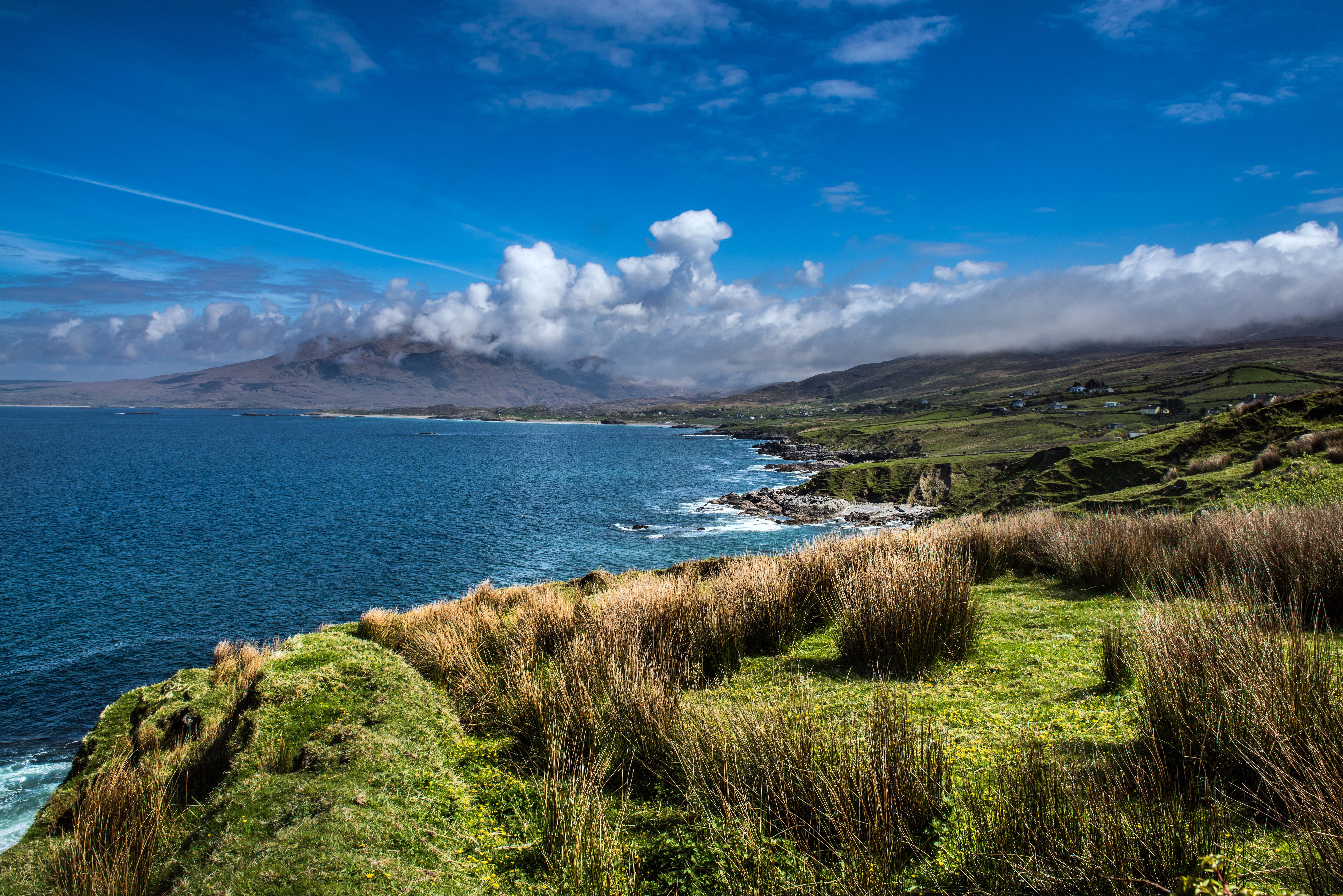 Beautiful Irish coastline on a sunny day with blue skies near Galway