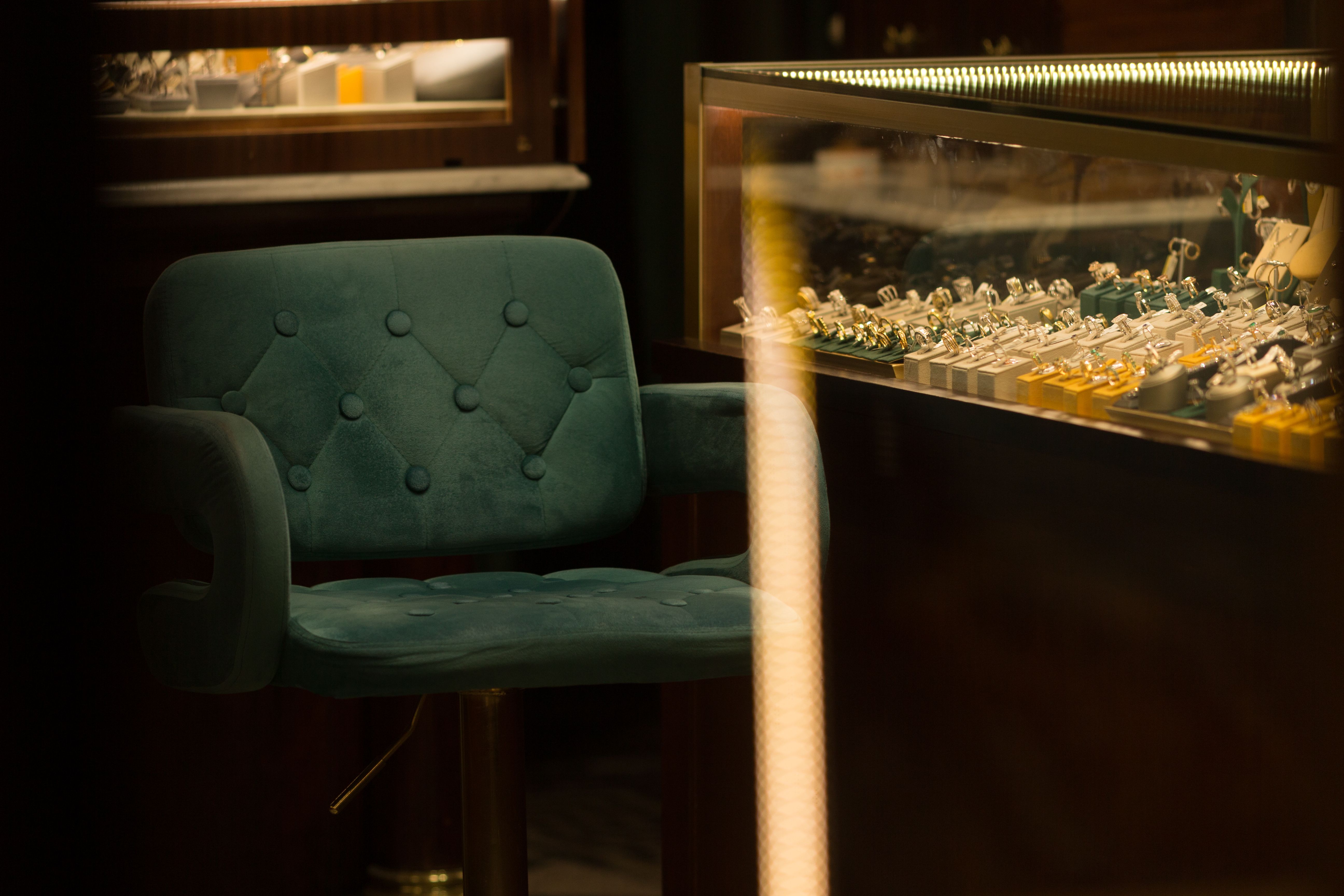 Jewelry and Gems Displayed in a Shop Window at Night