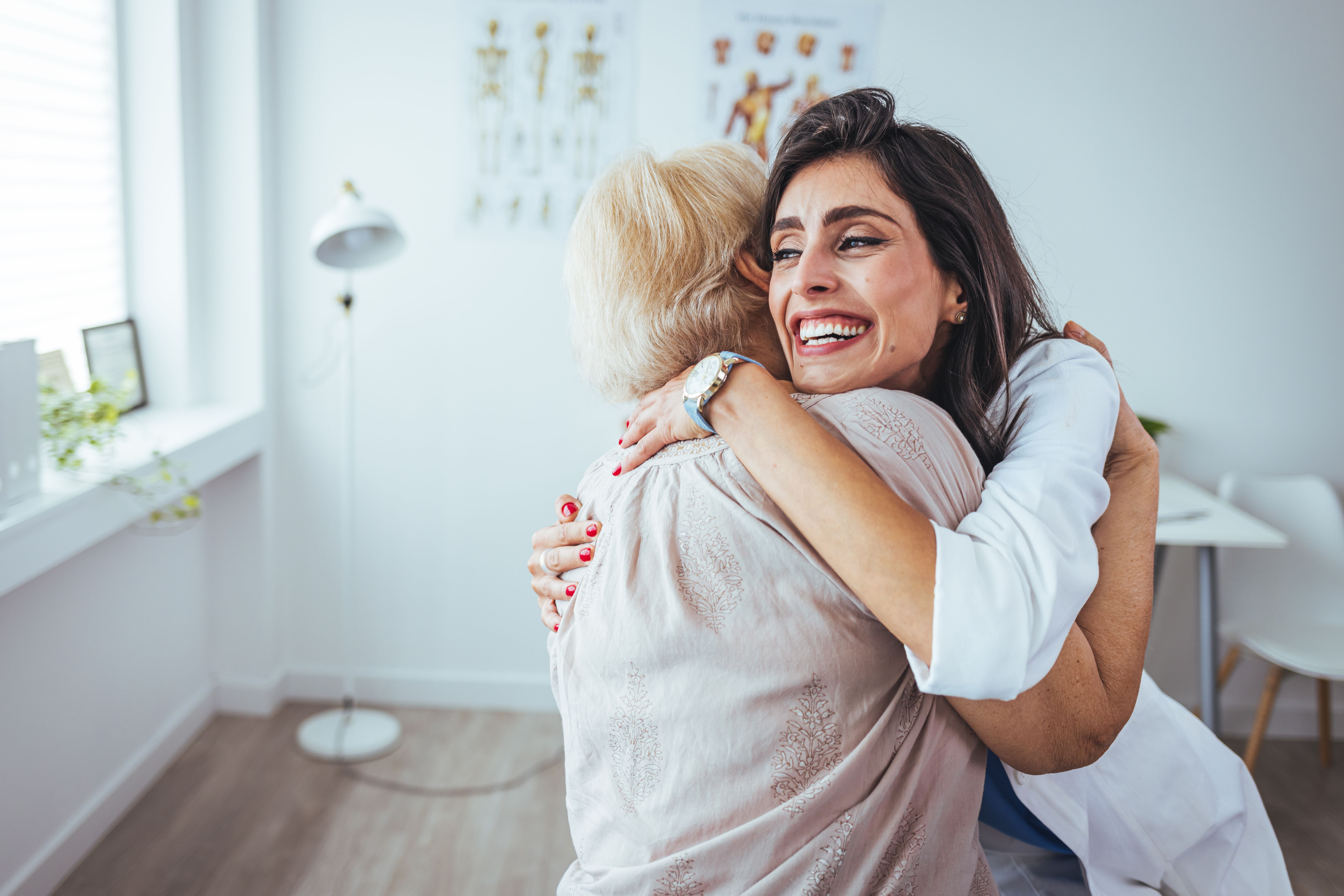 Shot of a young nurse caring for a senior woman. Shot of a young nurse caring for a senior woman.