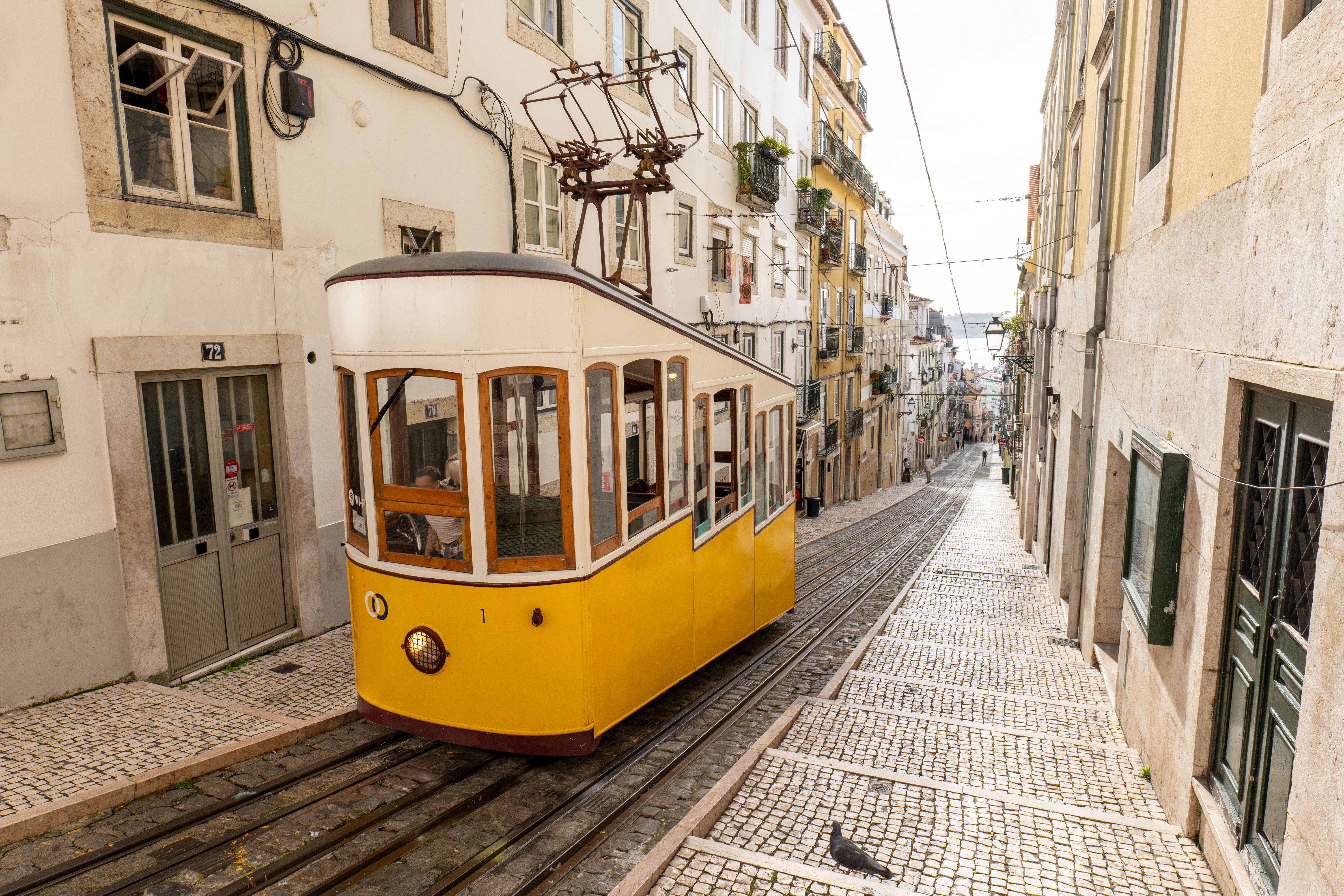 The famous yellow tramway in Lisbon The famous yellow tramway in Lisbon