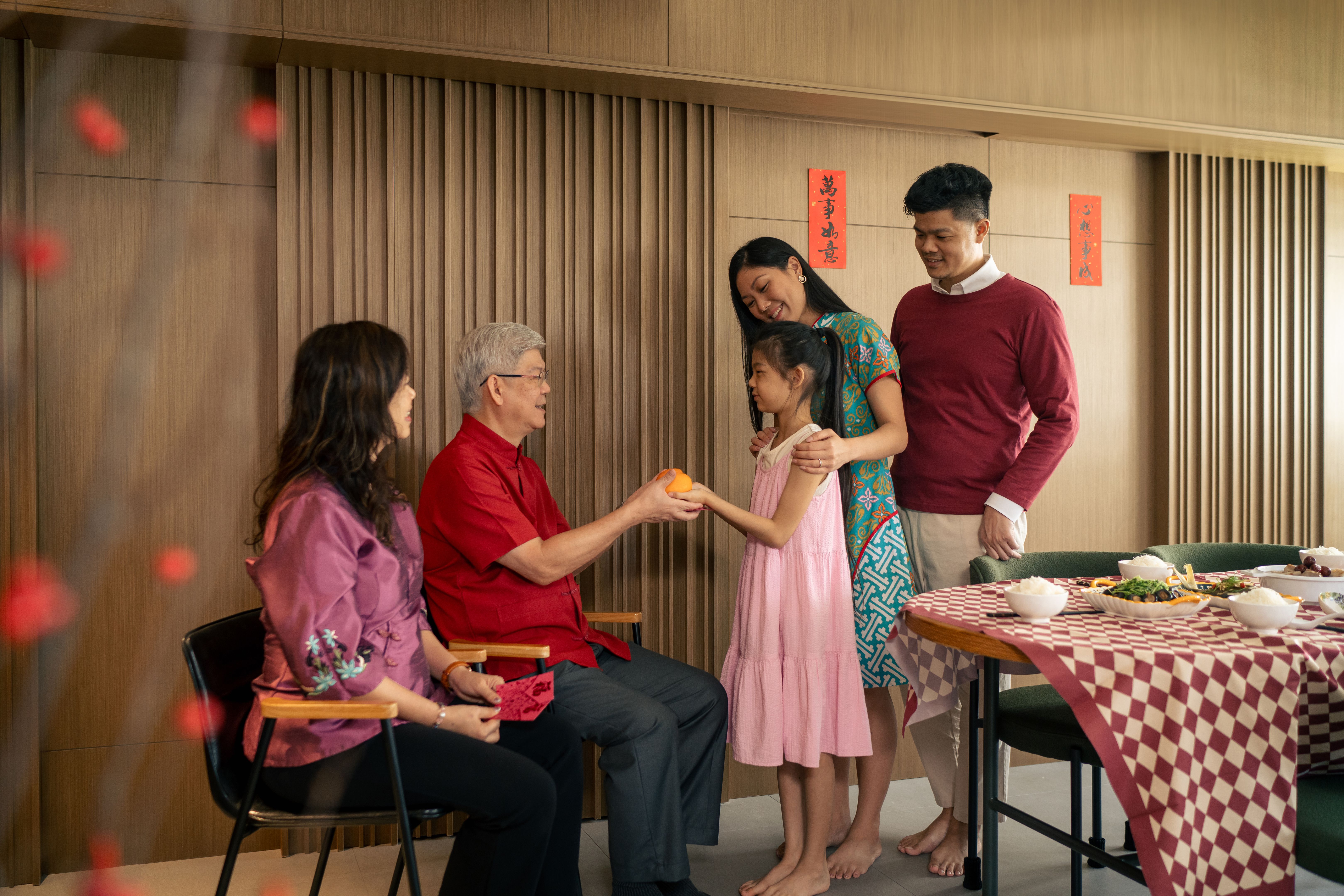 Multi generational Asian Chinese family celebrating Lunar New Year