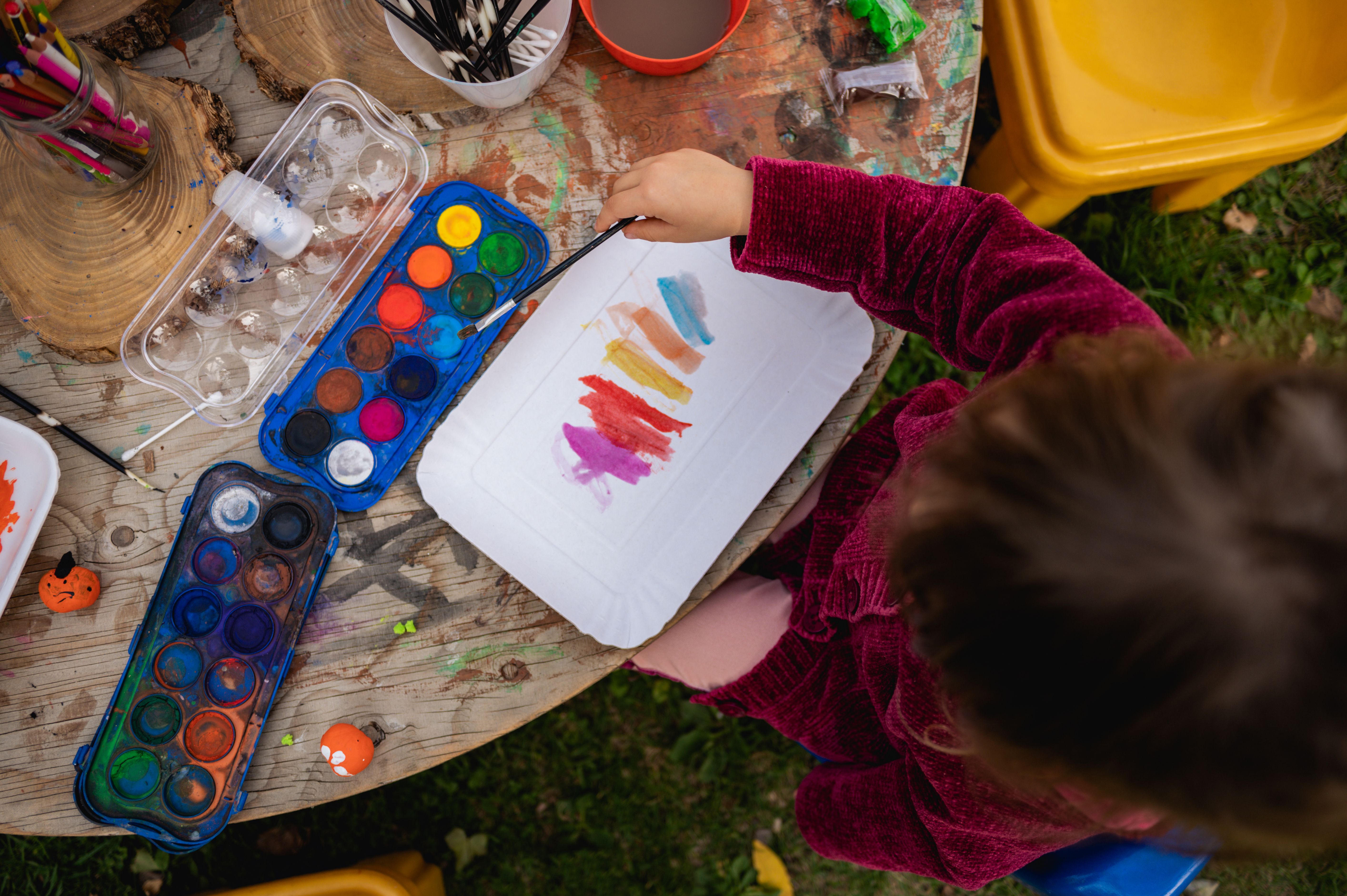 children painting garden