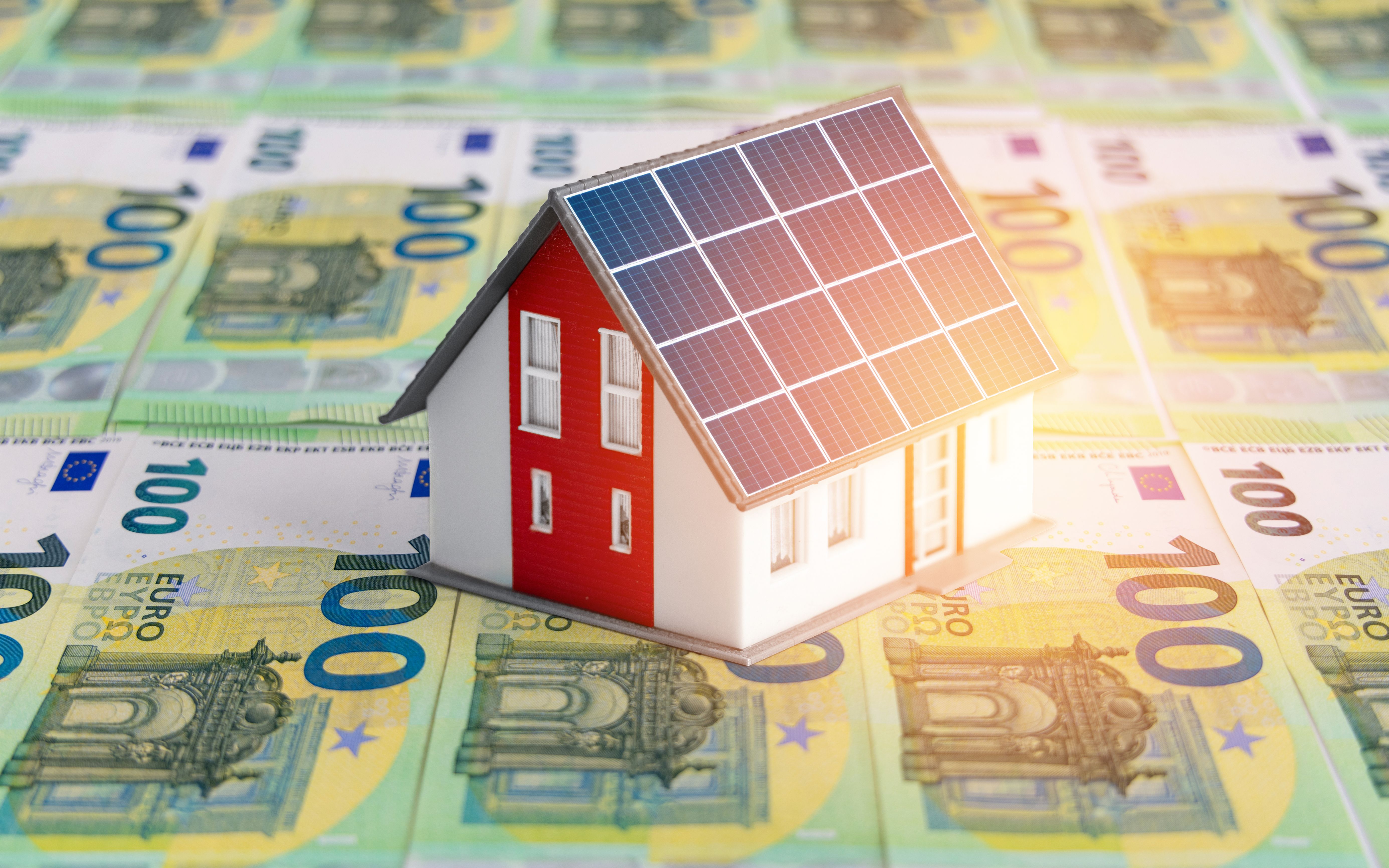 Solar panel house roof real estate 100 banknotes background