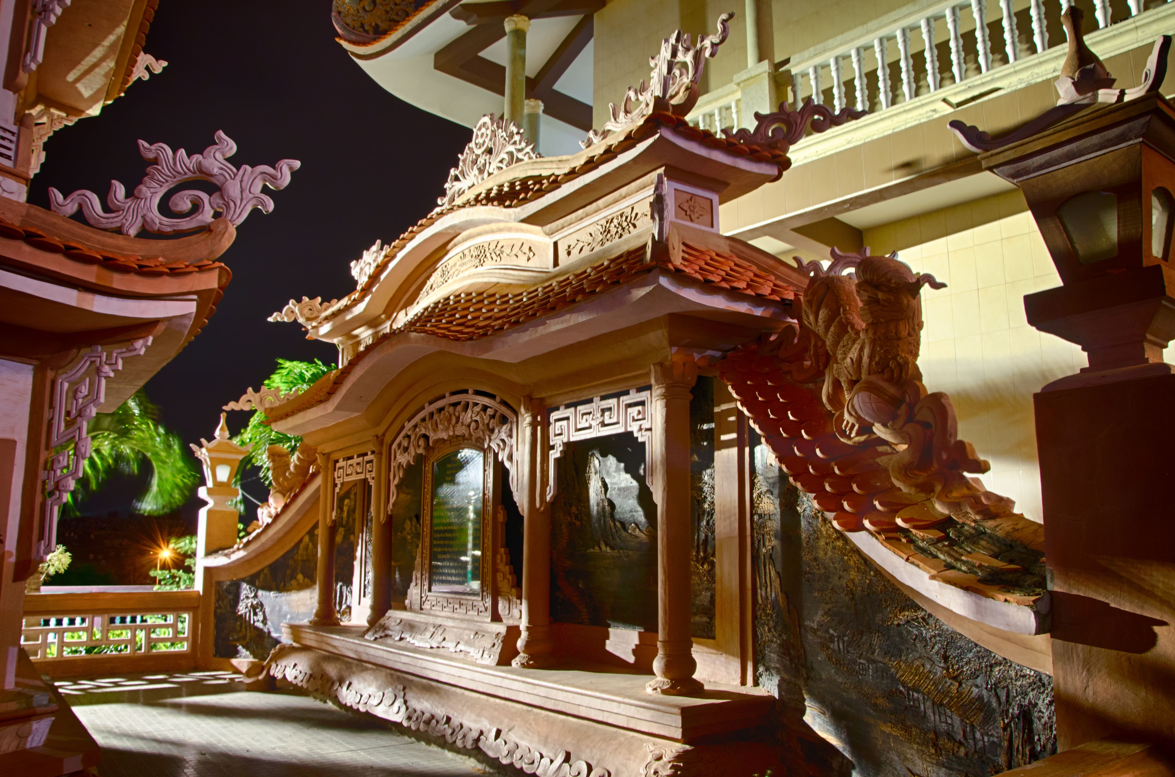Sculptural exterior composition in Buddhist temple. Vietnam.